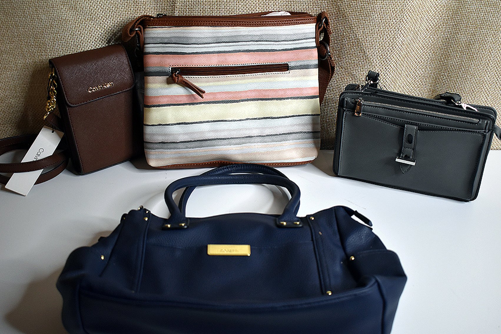 Image for A Large Inventory of Consumer Goods, Bedding, Collegiate Apparel & More.