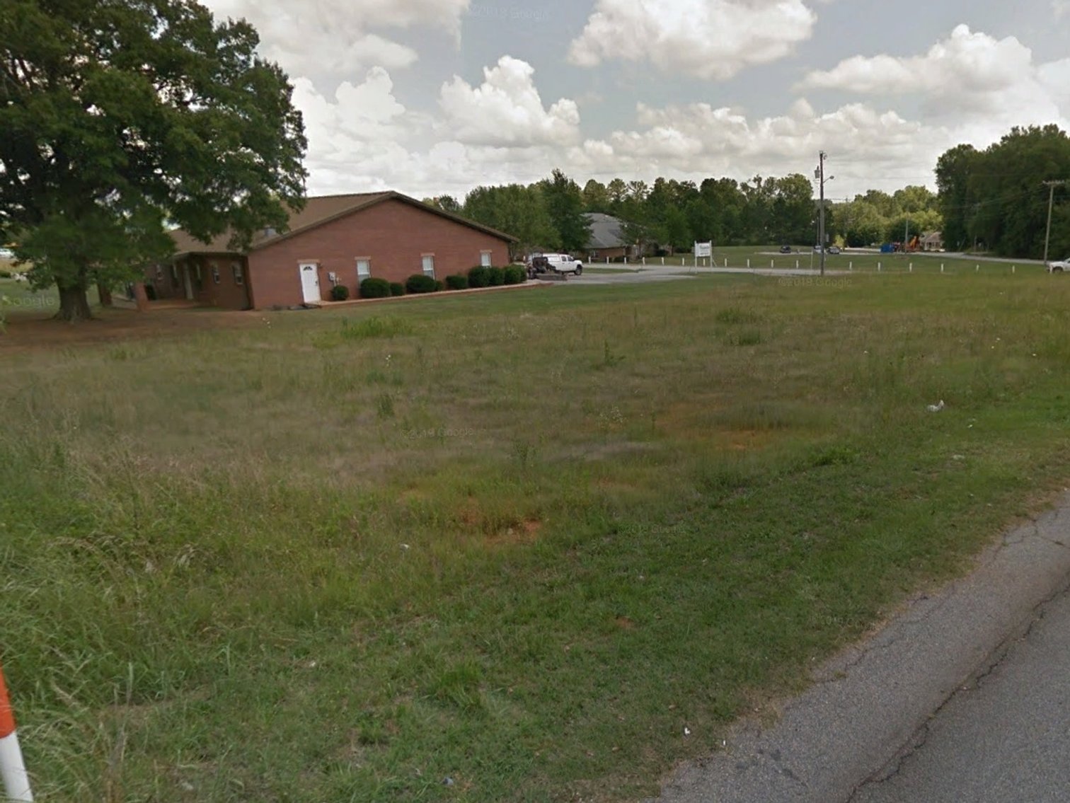 Image for Property #103: Greenwood, SC: .49± Acre Commercial Corner Lot (Lot 52) at Overland Dr. & Parkway (Beside 212 Overland Dr.), Greenwood, SC 29646 (Greenwood County)