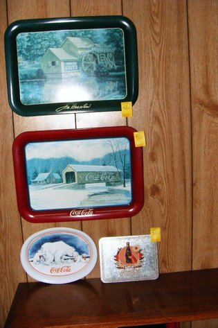 3 tin Coke serving trays, 1 Jim Harrison serving tray