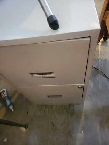 Metal school desk, file cabinet, small stool