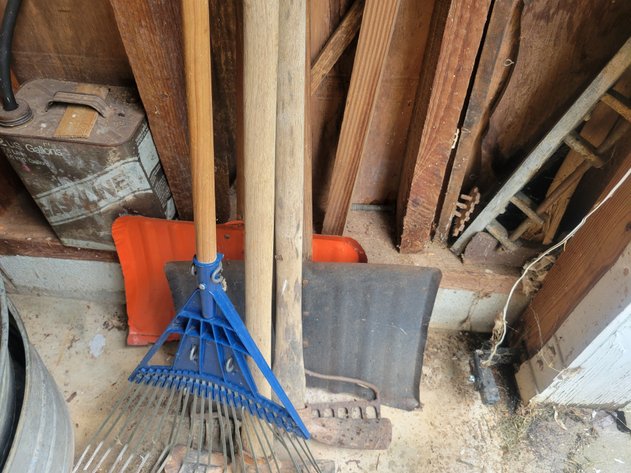 Rakes, shovels, mattocks, 2 gal gasoline can