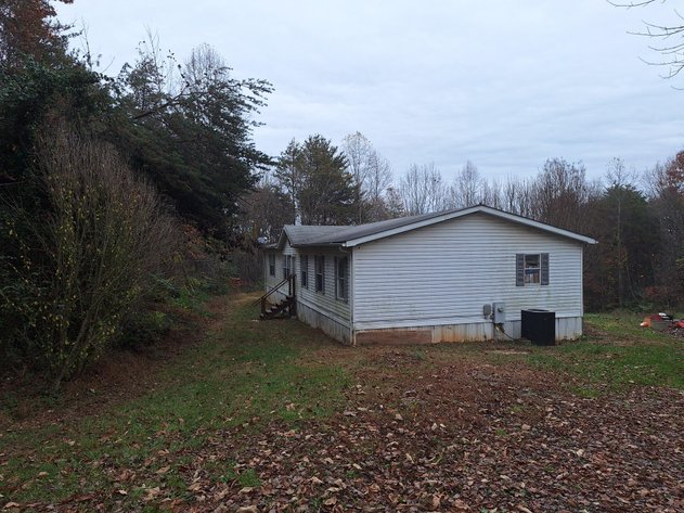 Real Estate Auction - 3-Bedroom Home on 4 Acres in Dobson, NC