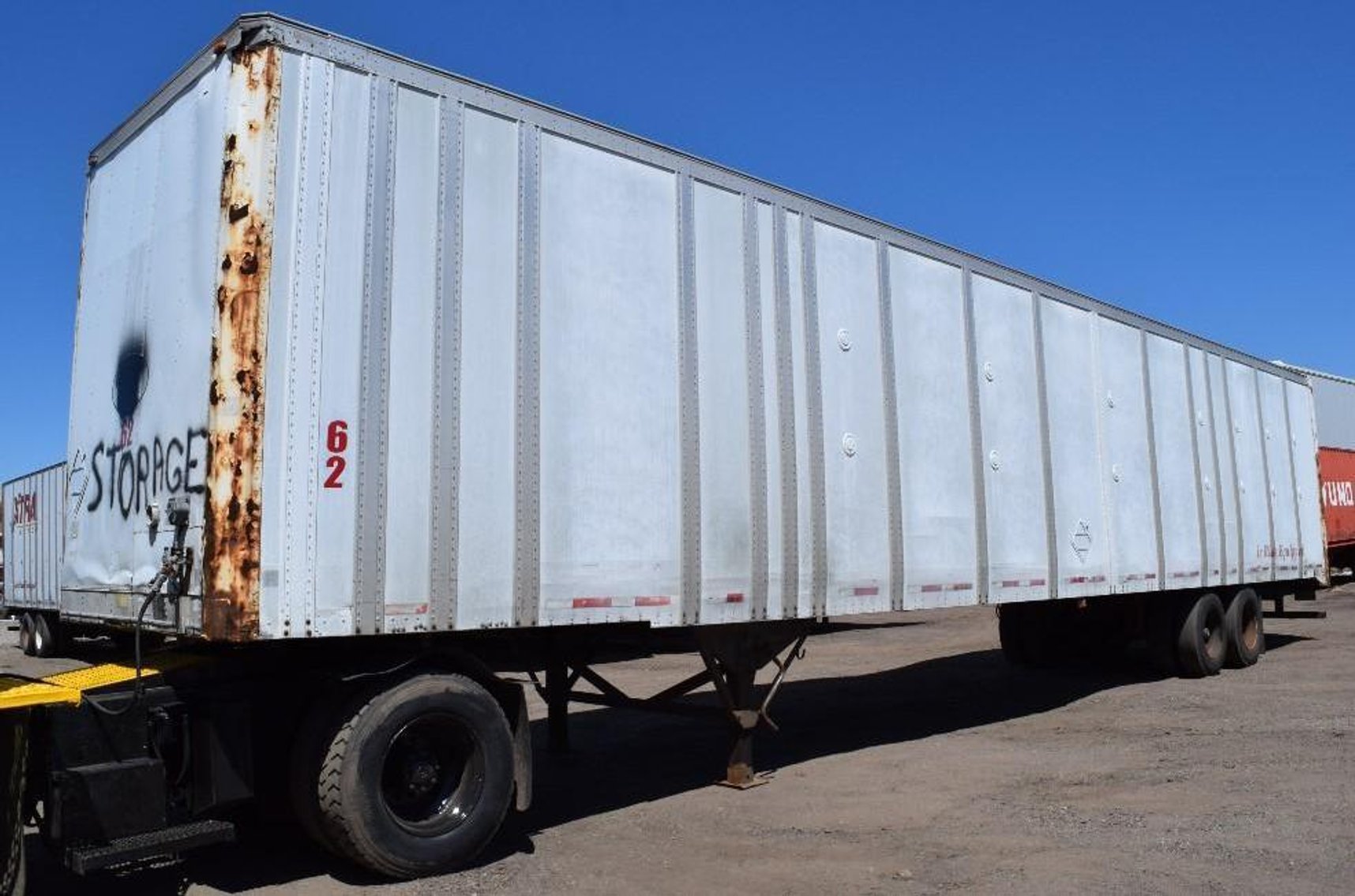 International Semi - (2) 2005 Aluminum Walking Floor Trailers - (1) Storage Trailer