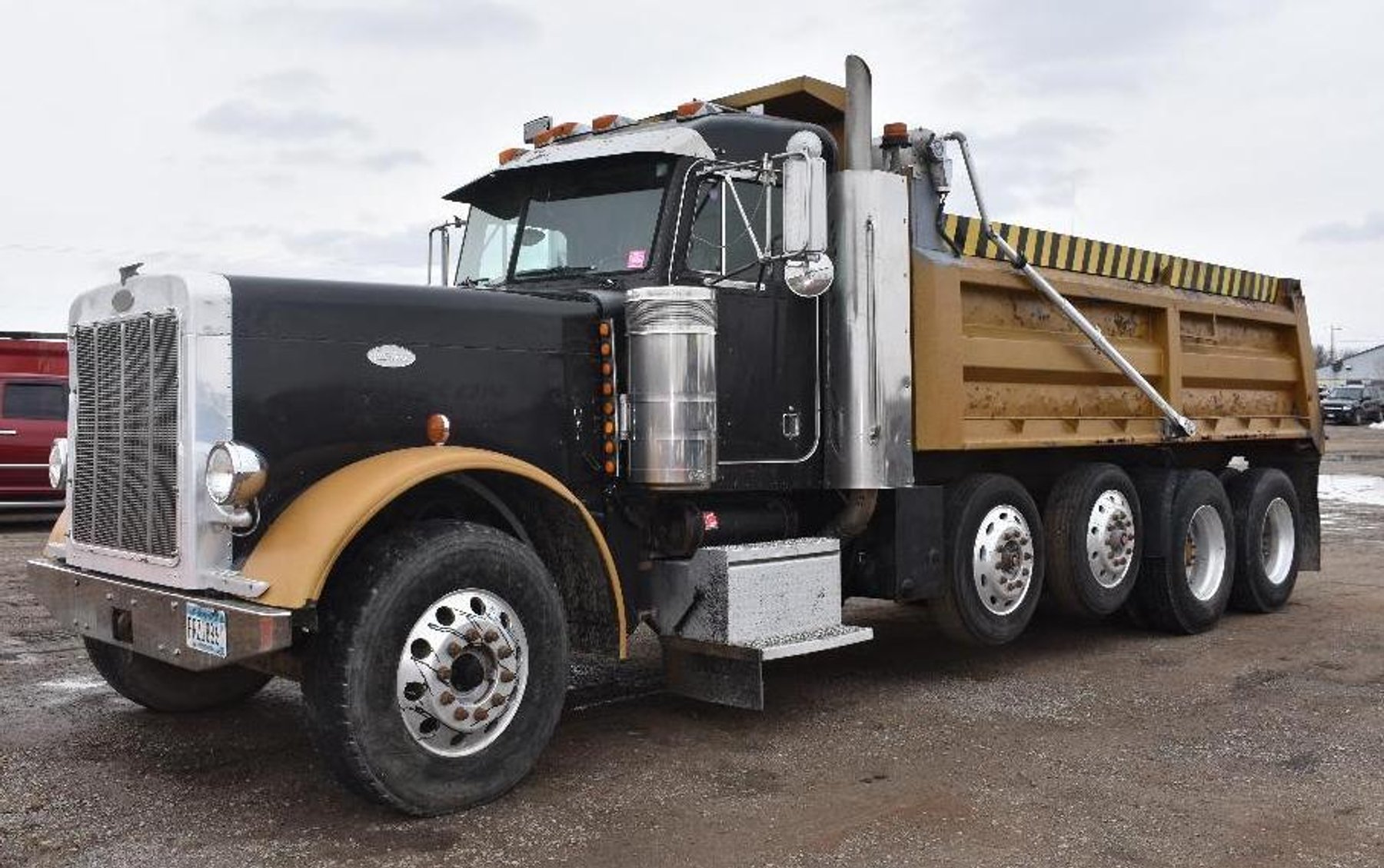 (4) Peterbilt Quad Axle Dump Trucks