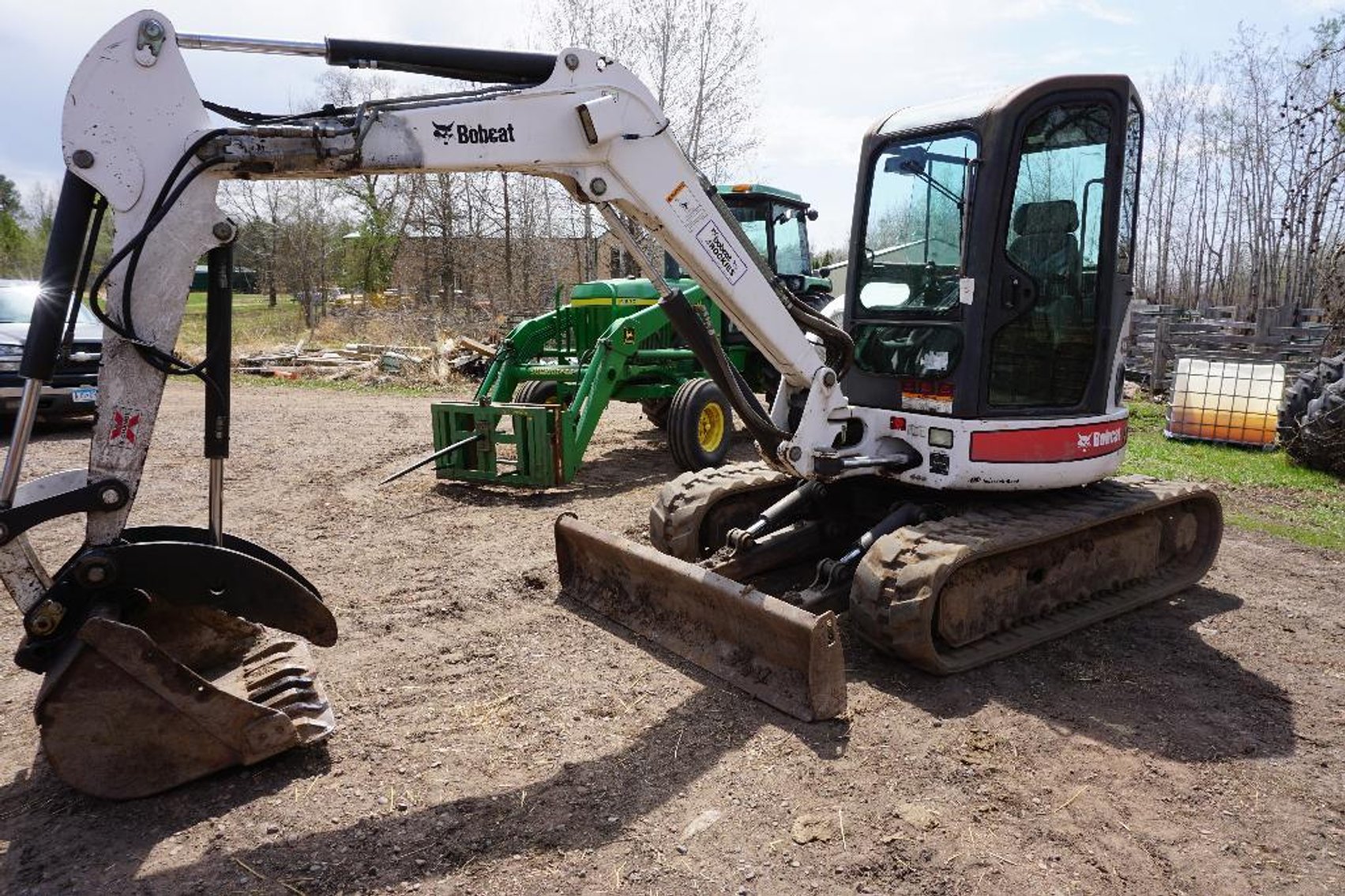 John Deere Tractors, Bobcat 435ZHS Trackhoe and Hay Equipment