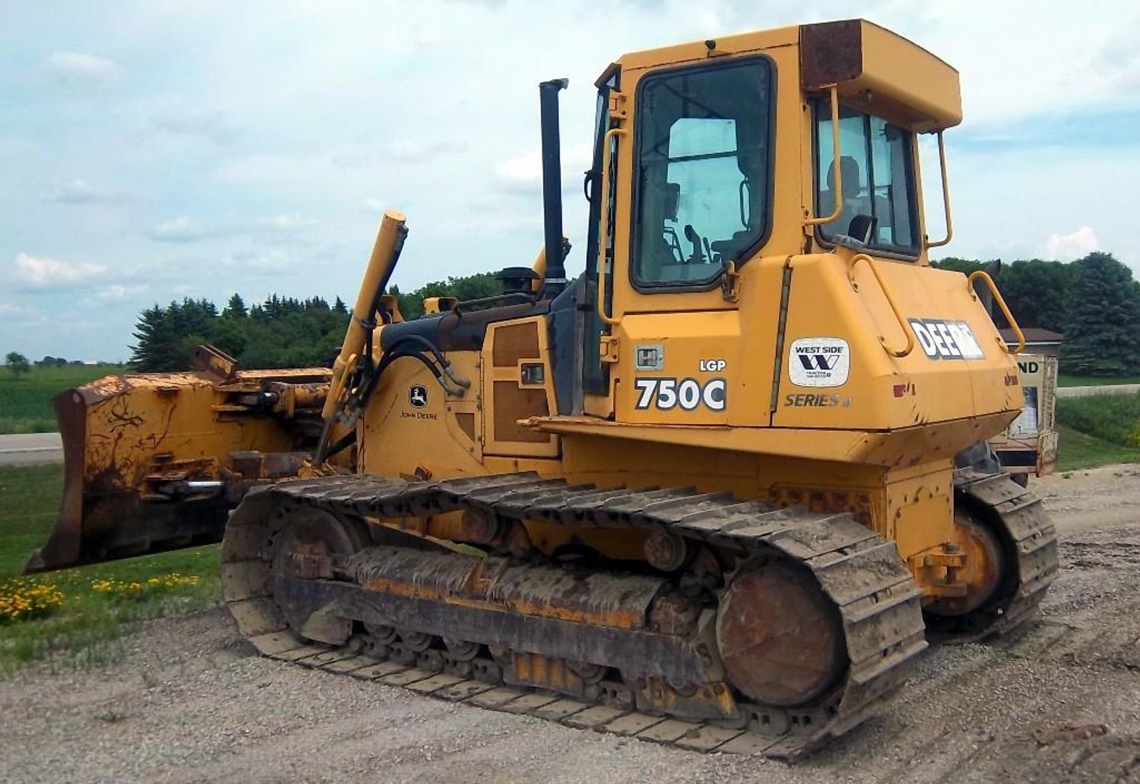 2007 IHC 9400 Semi, Ingersoll Rand Packer, John Deere Dozer, Road Grader & Caterpillar Extendahoe