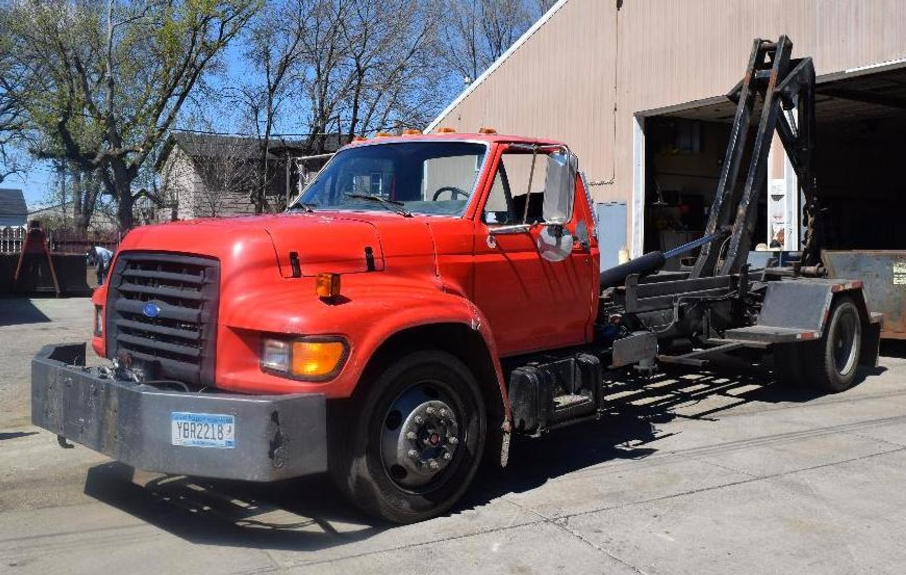 Hook Roll Off Trucks & Dumpsters