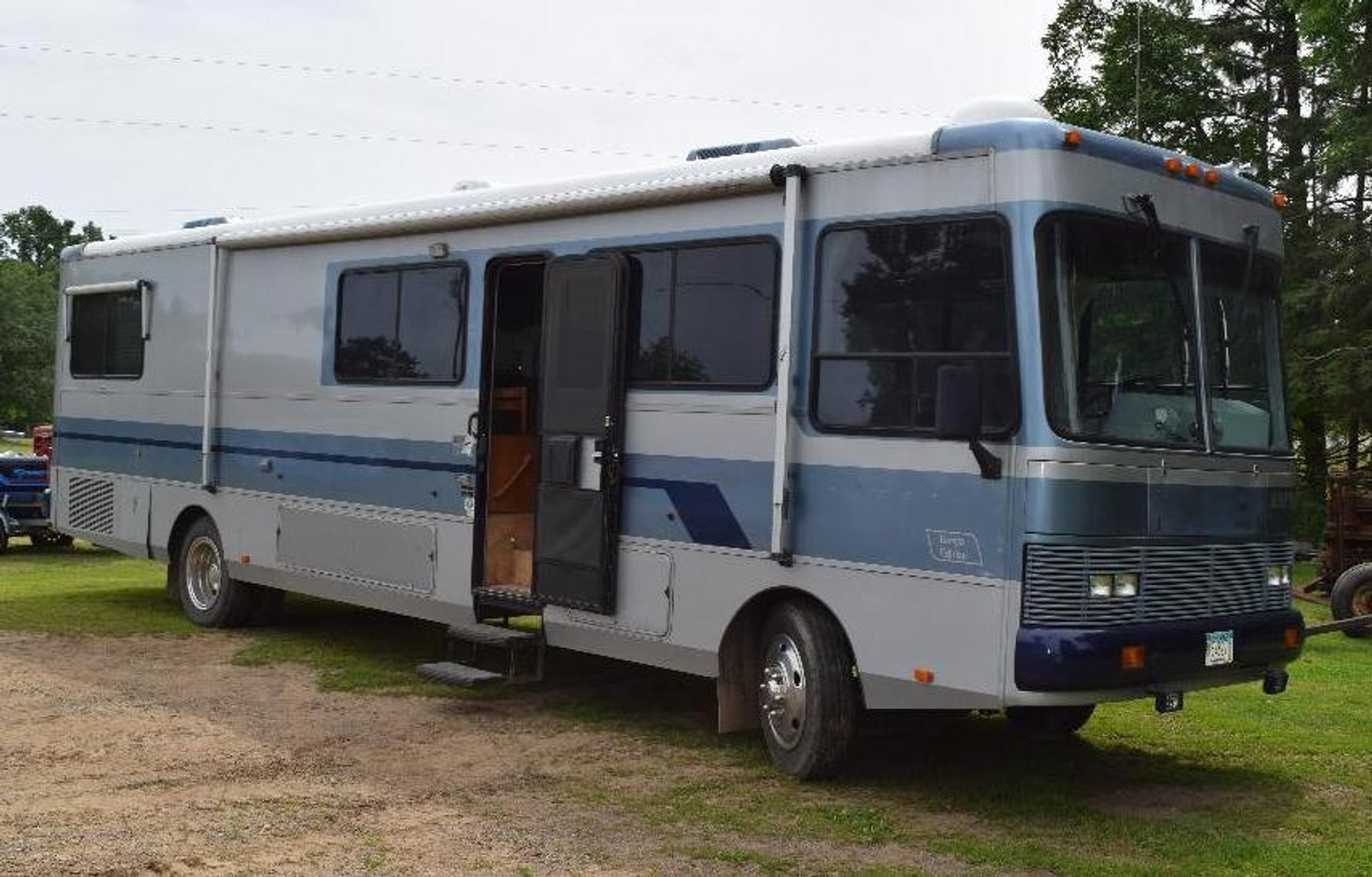 Motorhome, Boats, ATV's, Motorcycle, and a Van