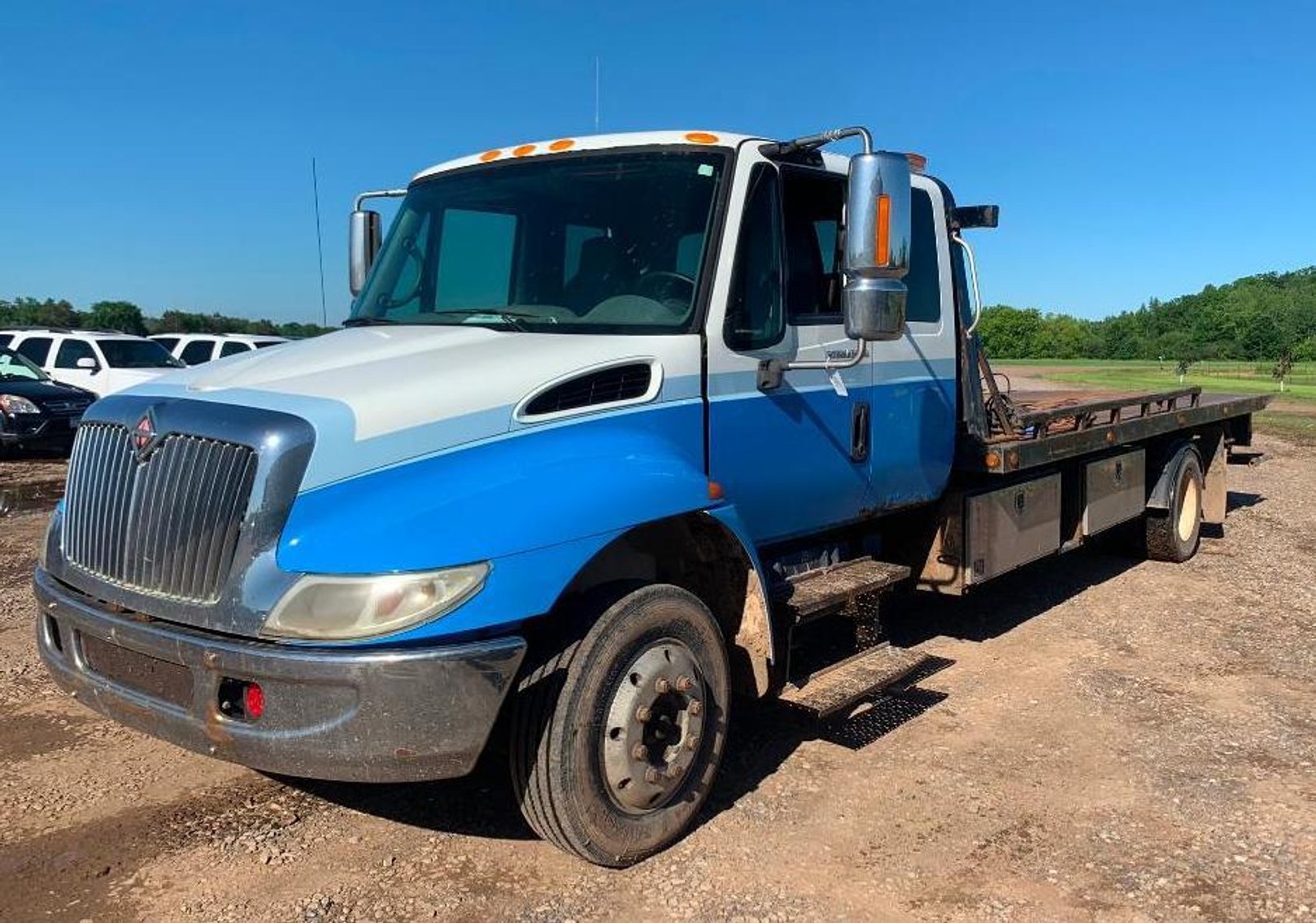 Sun Valley 7-Car Hauler, 2001 Kenworth W900L, 2010 Fontaine 53’ Step Deck, 2005 Freightliner M2 26’ Van Body, 2003 IH Steel Car Hauler With Rear Stinger