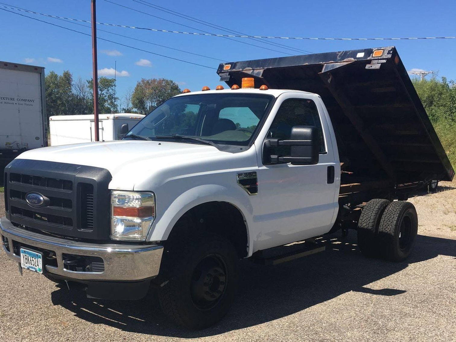 (4) Cube Trucks, (2) Express Vans & 2010 Ford F350 XL Flatbed With Hoist