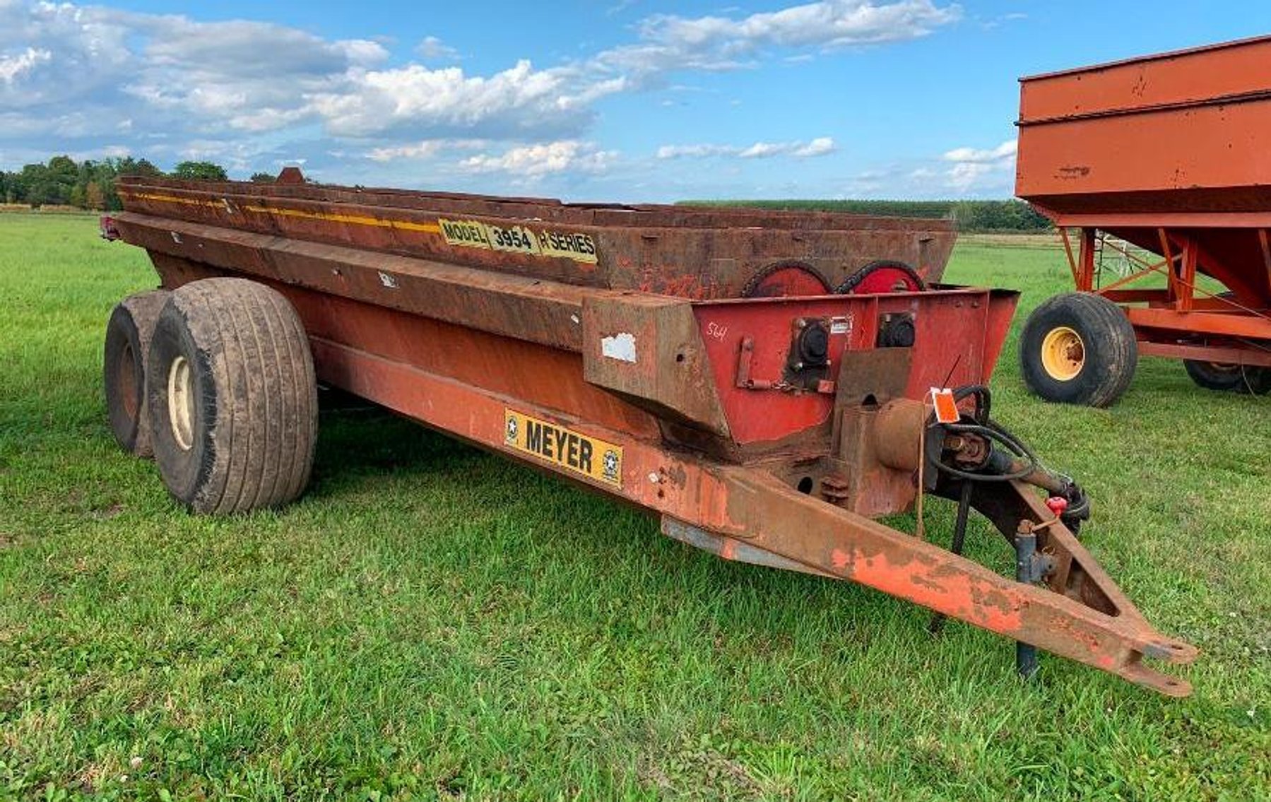 Farm Machinery: (12) Gravity Boxes, Cat Dozer, Cattle Trailer, Vintage Tractor & Attachments