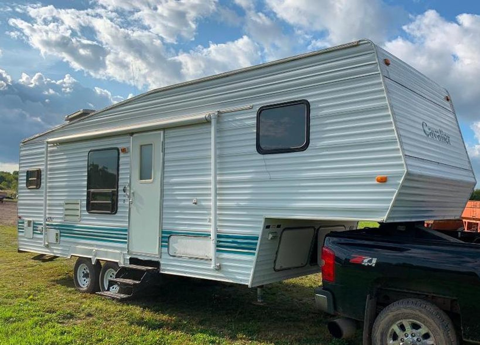 1997 Lincoln Town Car, John Deere 155C, Honda 3-Wheeler & 1999 Cavelier 30' 5th Wheel Camper