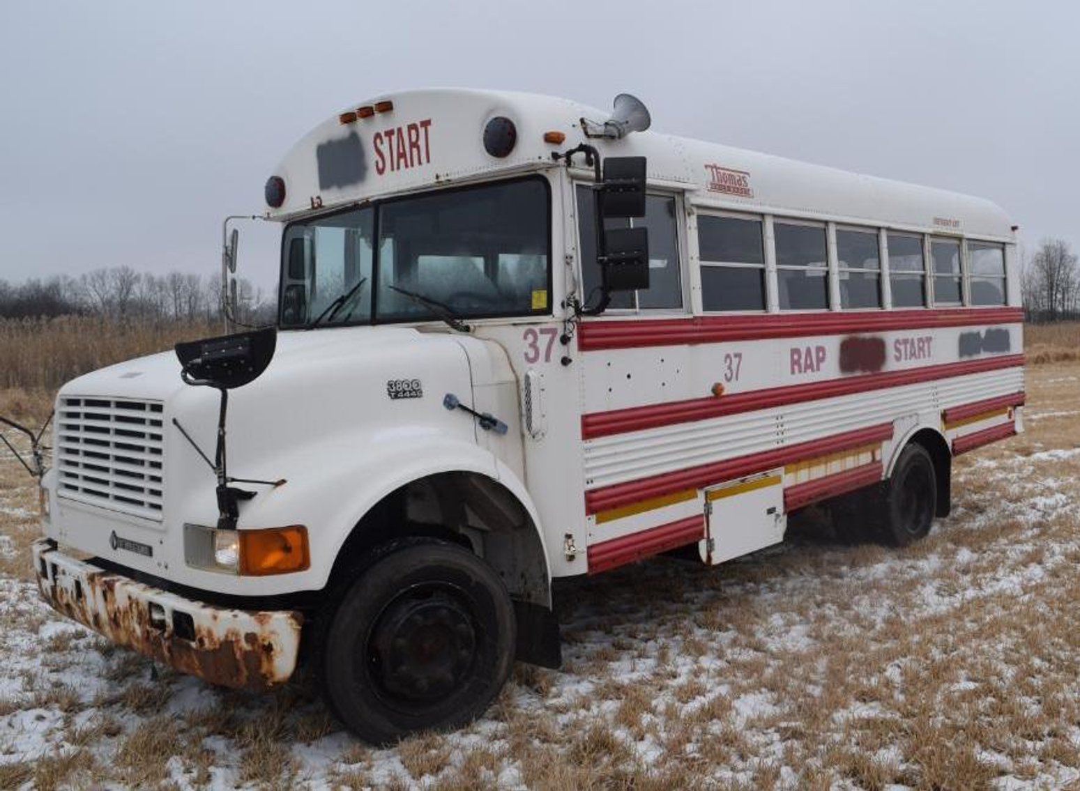 2009 Freightliner Thomas Bus & 1998 International Navistar Bus