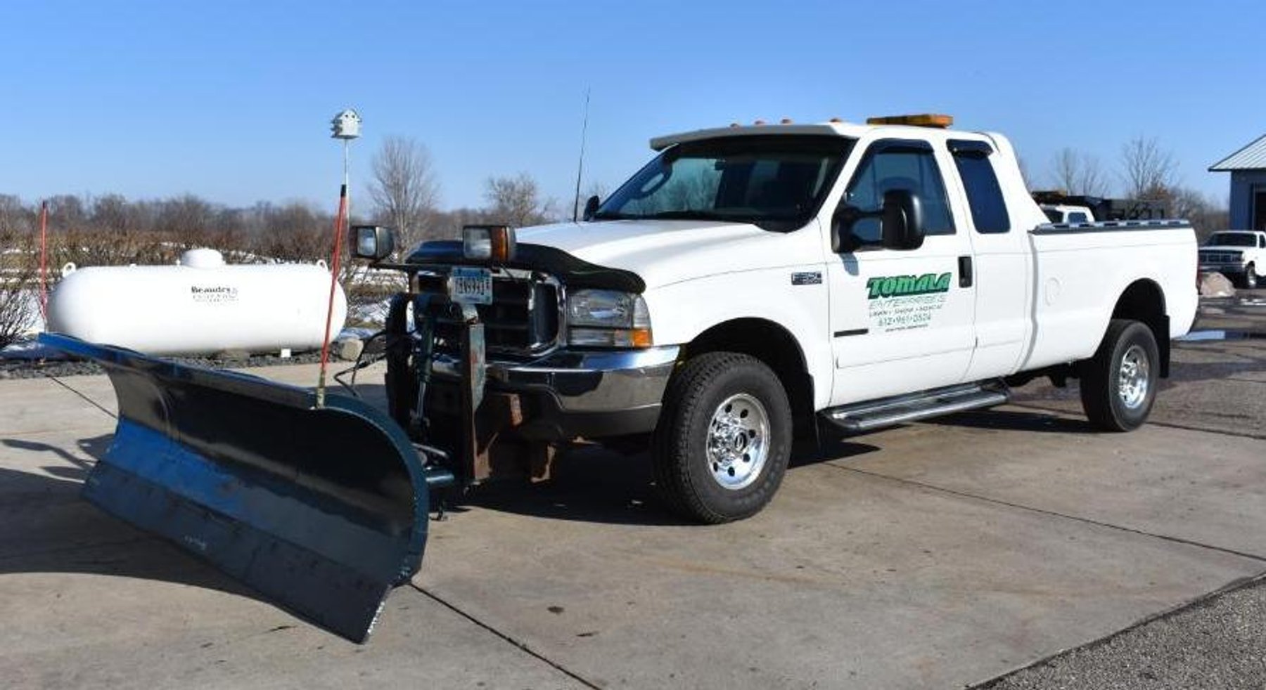 1997 Ford F-350 XL Long Box & 2003 Ford F-350 Super Duty Long Box With 9' Leo Plow