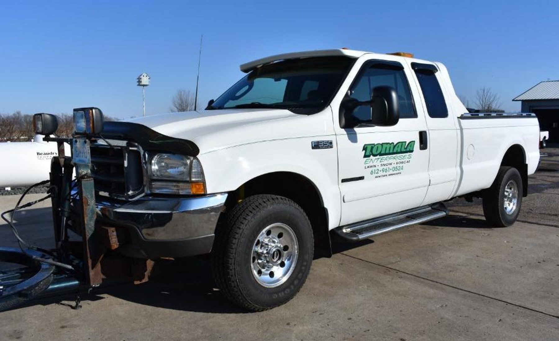 1997 Ford F-350 XL Long Box & 2003 Ford F-350 Super Duty Long Box With 9' Leo Plow