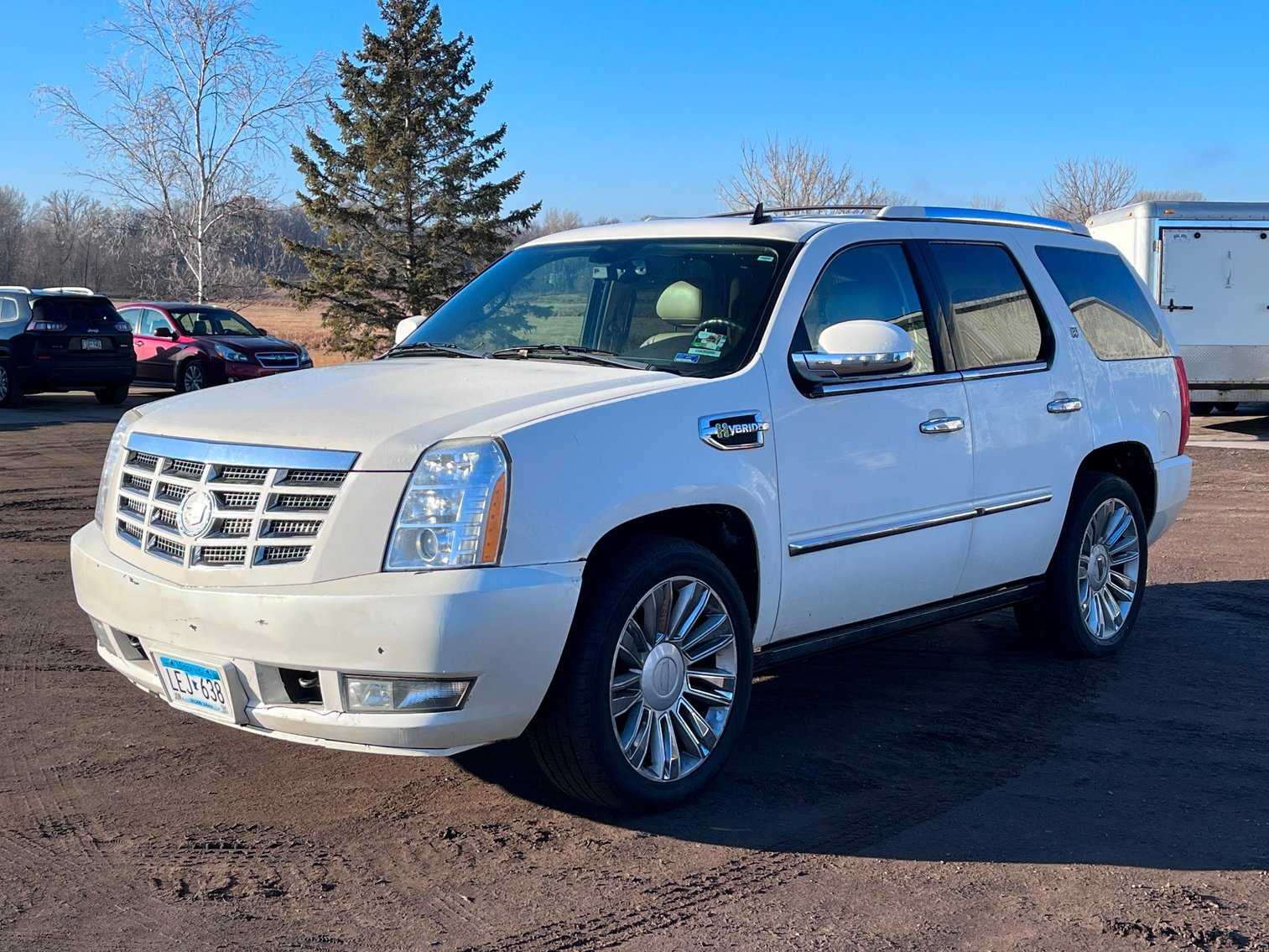 2010 Cadillac Hybrid SUV, 2002 Chevrolet Avalanche 4WD, 2003 Dodge 1500