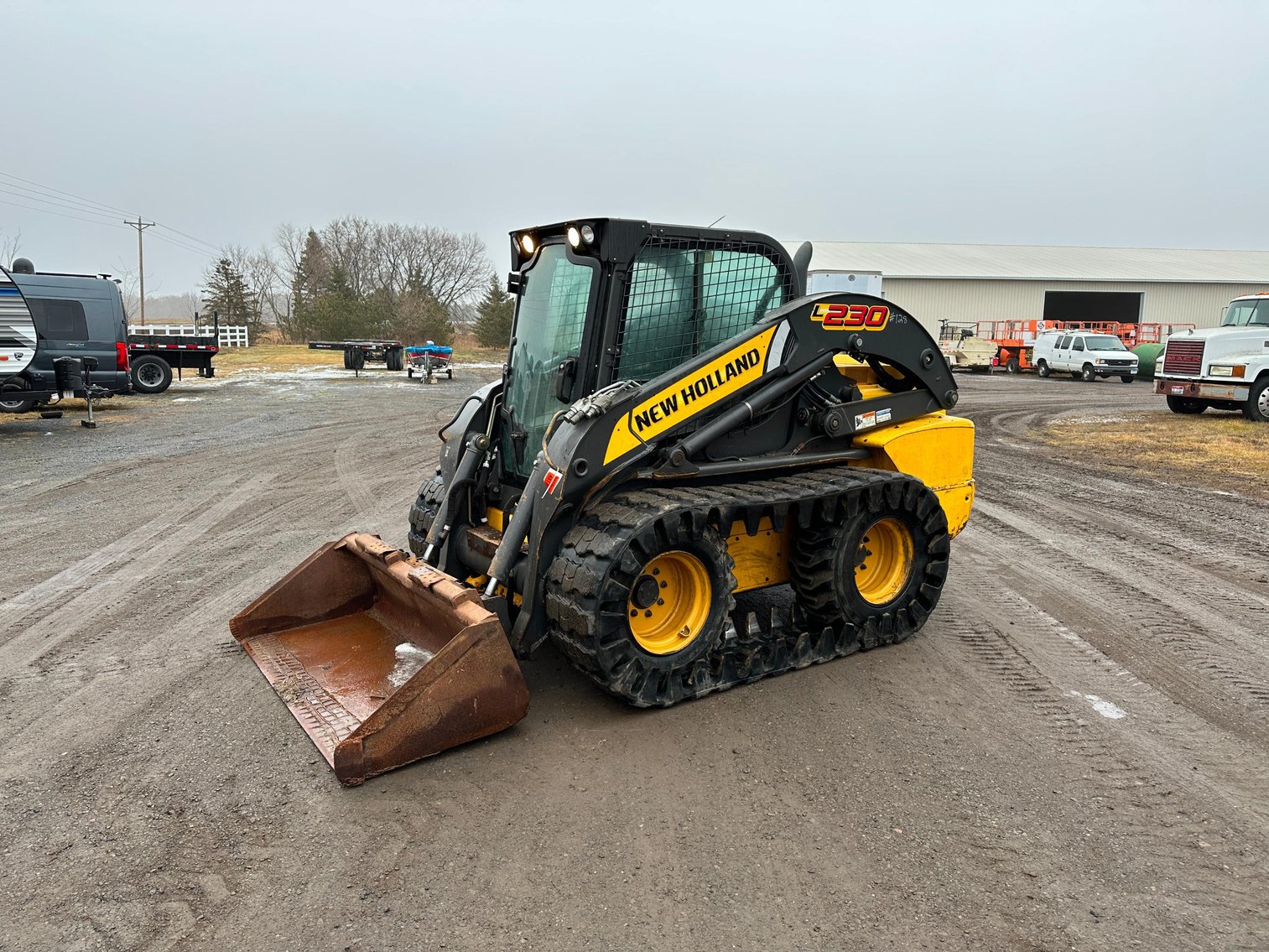 (2) Backhoes, New Holland Skid Loader, Plows