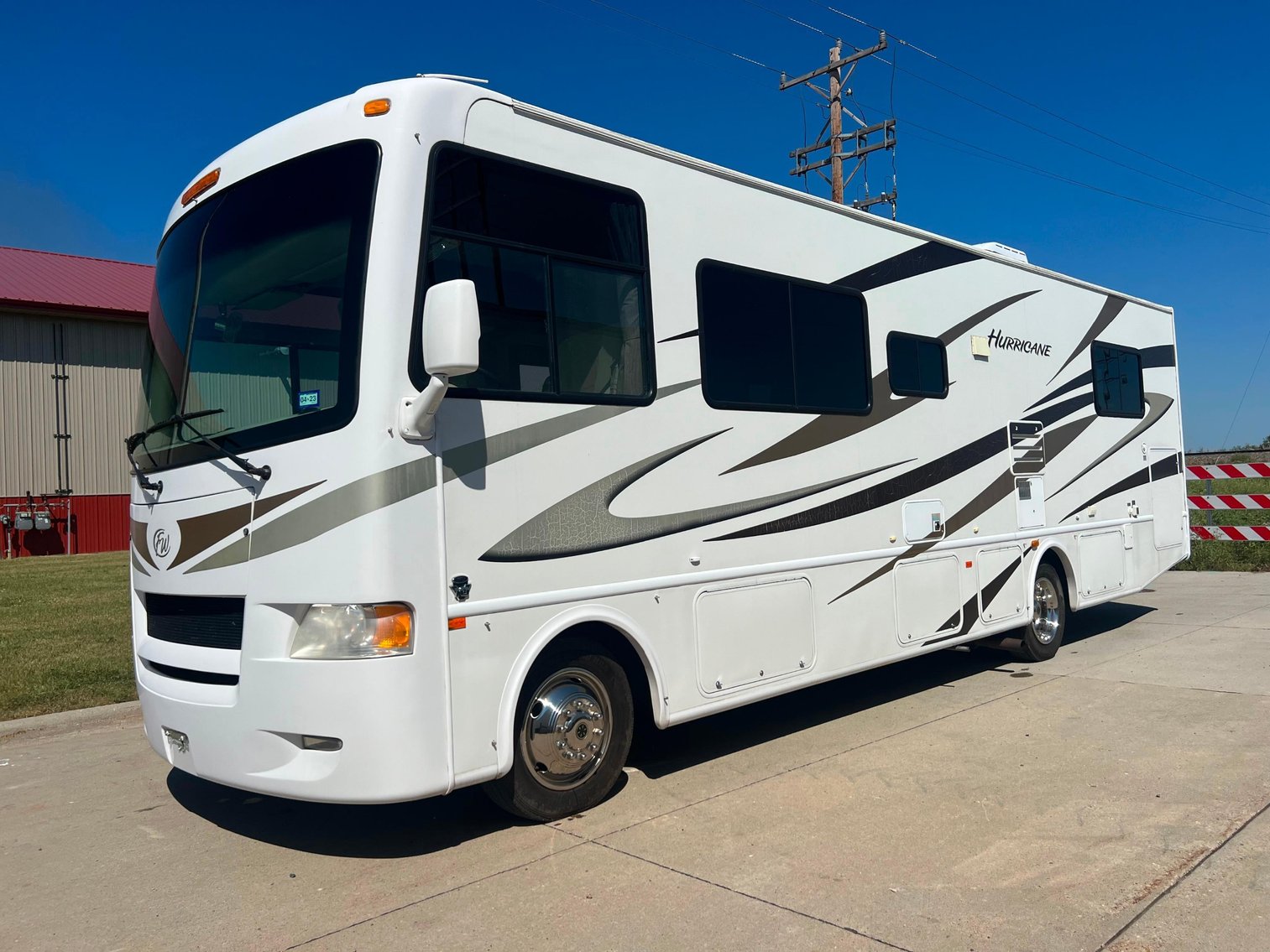 2011 Ford Hurricane 30Q Motor Coach, 1957 Chevrolet Bel Air, (2) Trailers, Attachments, Score Board