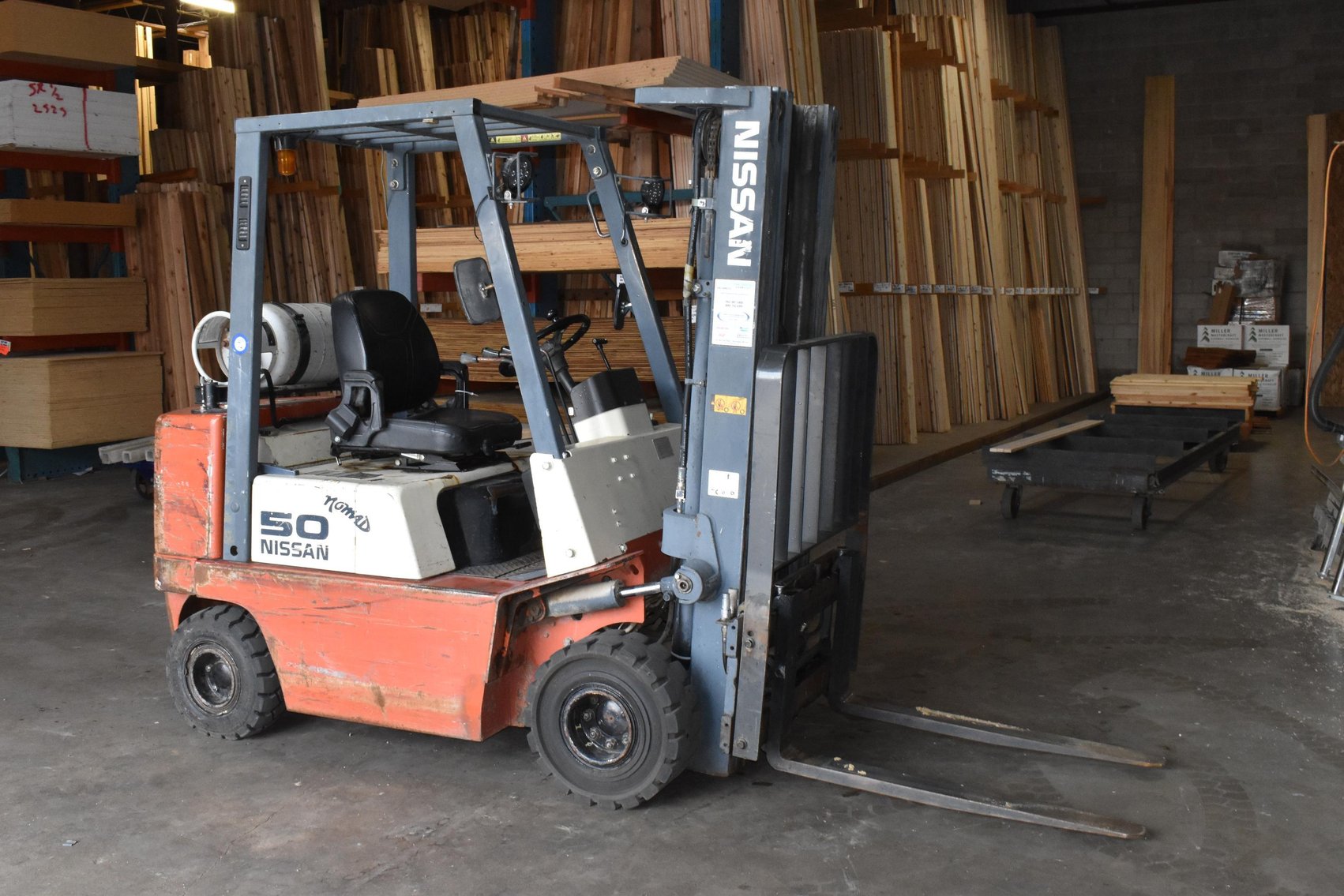 Nissan 50 5,000 Lb. LP Forklift, Kiln Dried Hardwoods, Shelving, Plywood