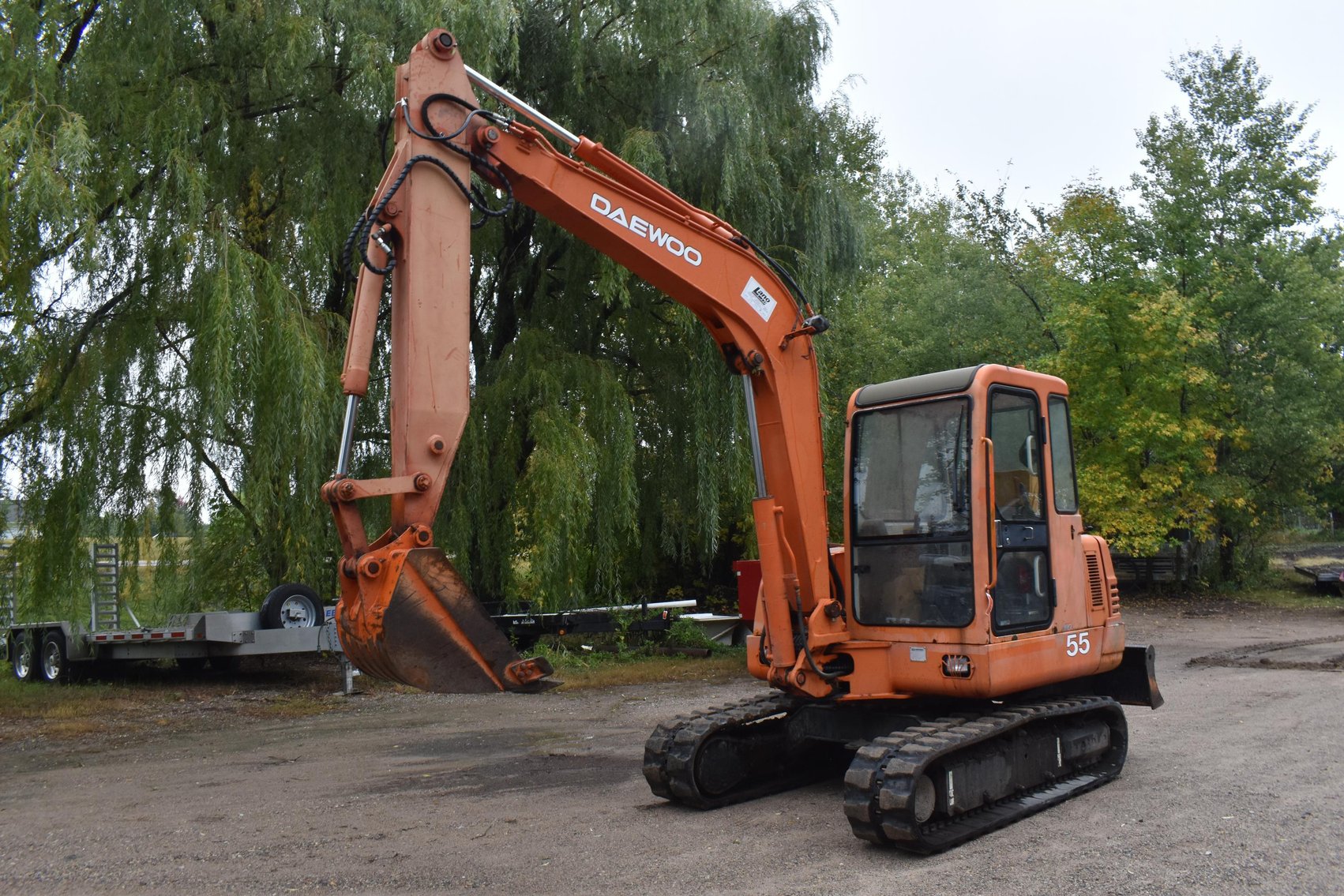 Plumbing & Heating (HVAC) Equipment Moving Auction: Daewoo SE 55 Excavator