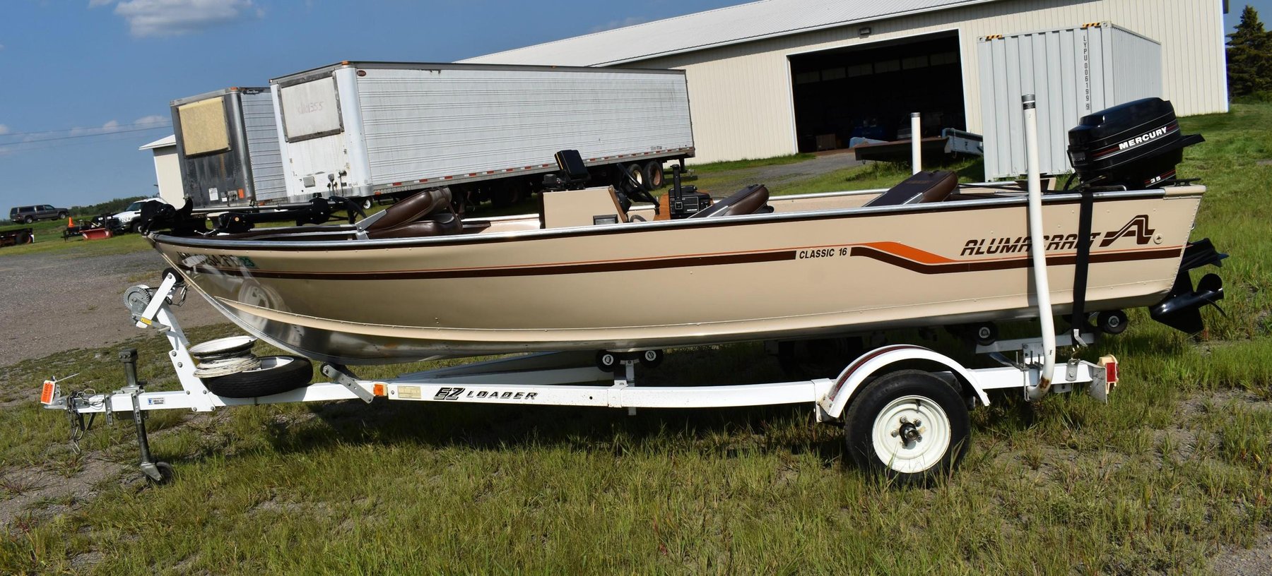 1987 Alumacraft Classic 16' Fishing Boat & 1987 EZ Loader Roller Trailer