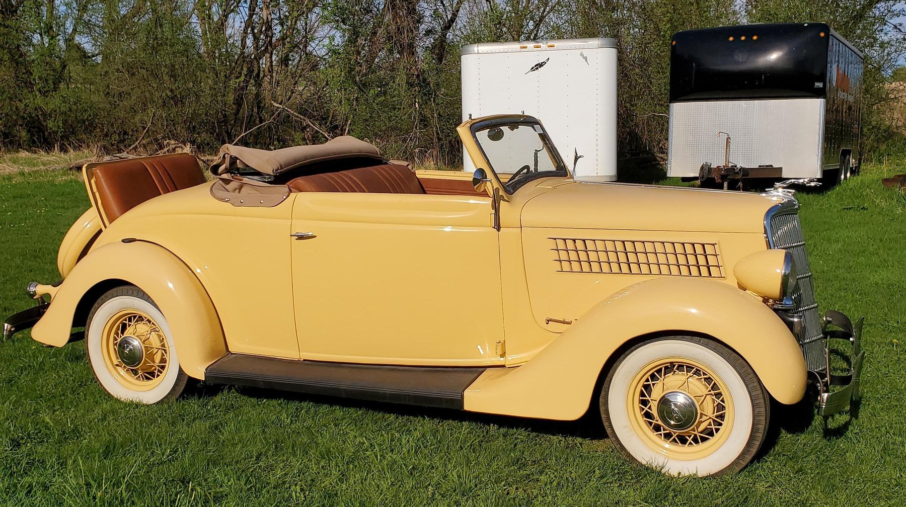 (2) 1935 Classic Cars, 2001 Ford Motorhome, Farmall Tractor, 18' Boat & Lawn Mowers