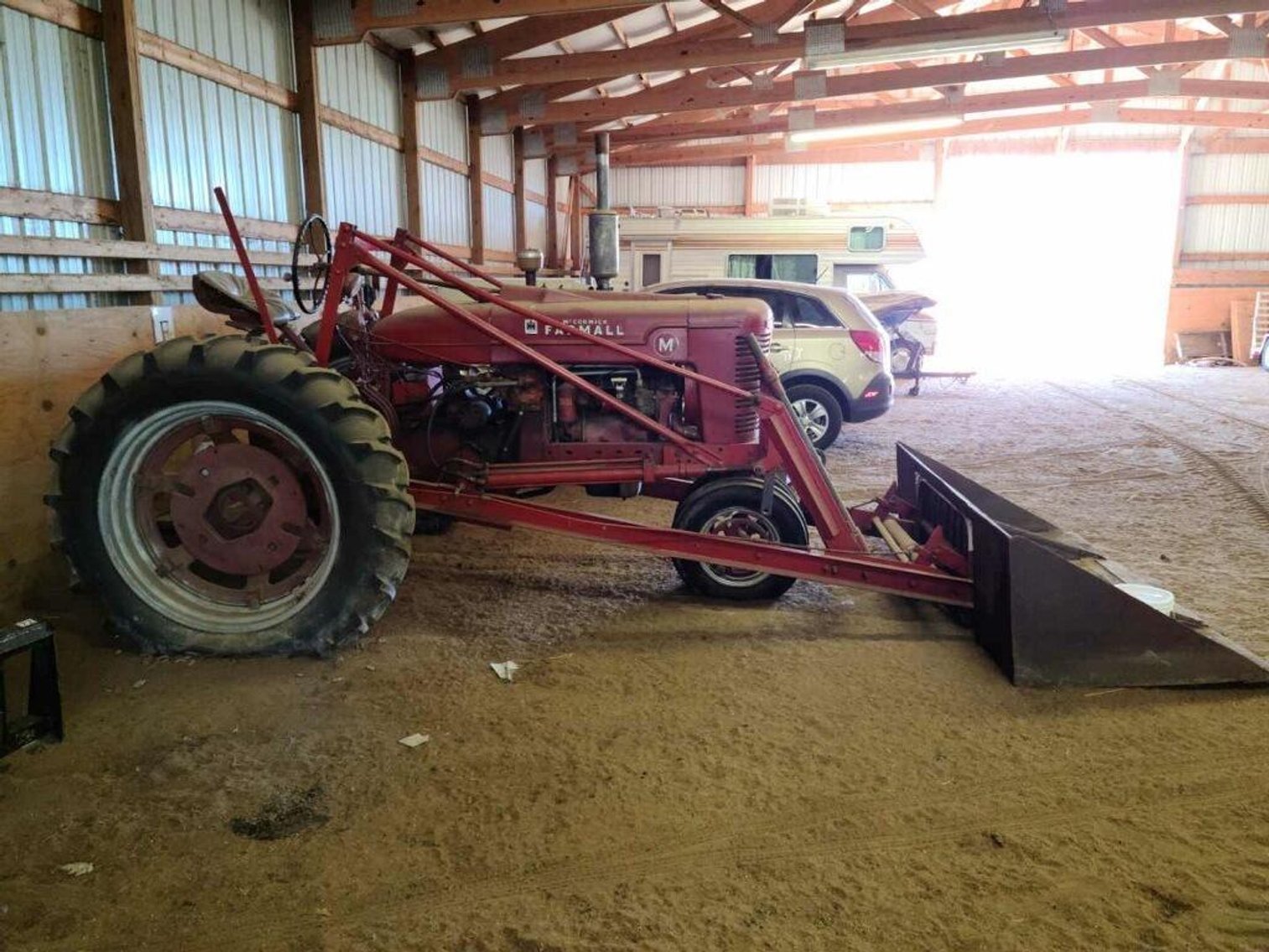 (2) 1935 Classic Cars, 2001 Ford Motorhome, Farmall Tractor, 18' Boat & Lawn Mowers