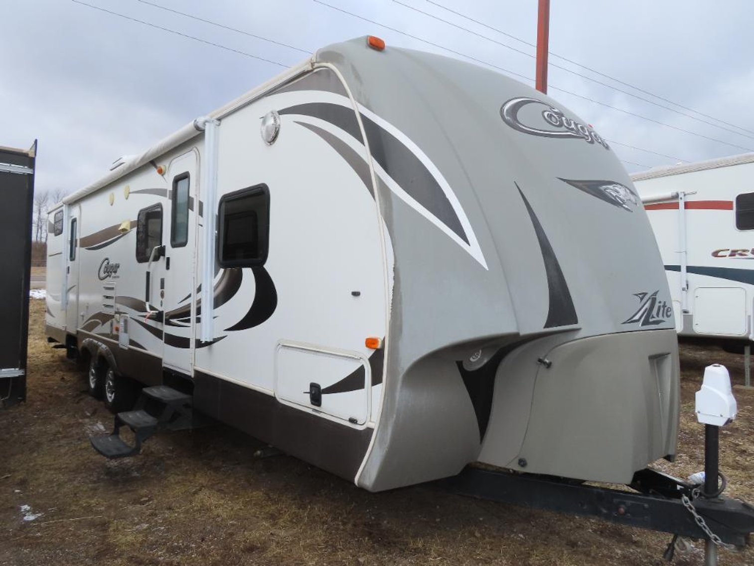 30 Units: (8) 5th Wheels and (22) Travel Trailers