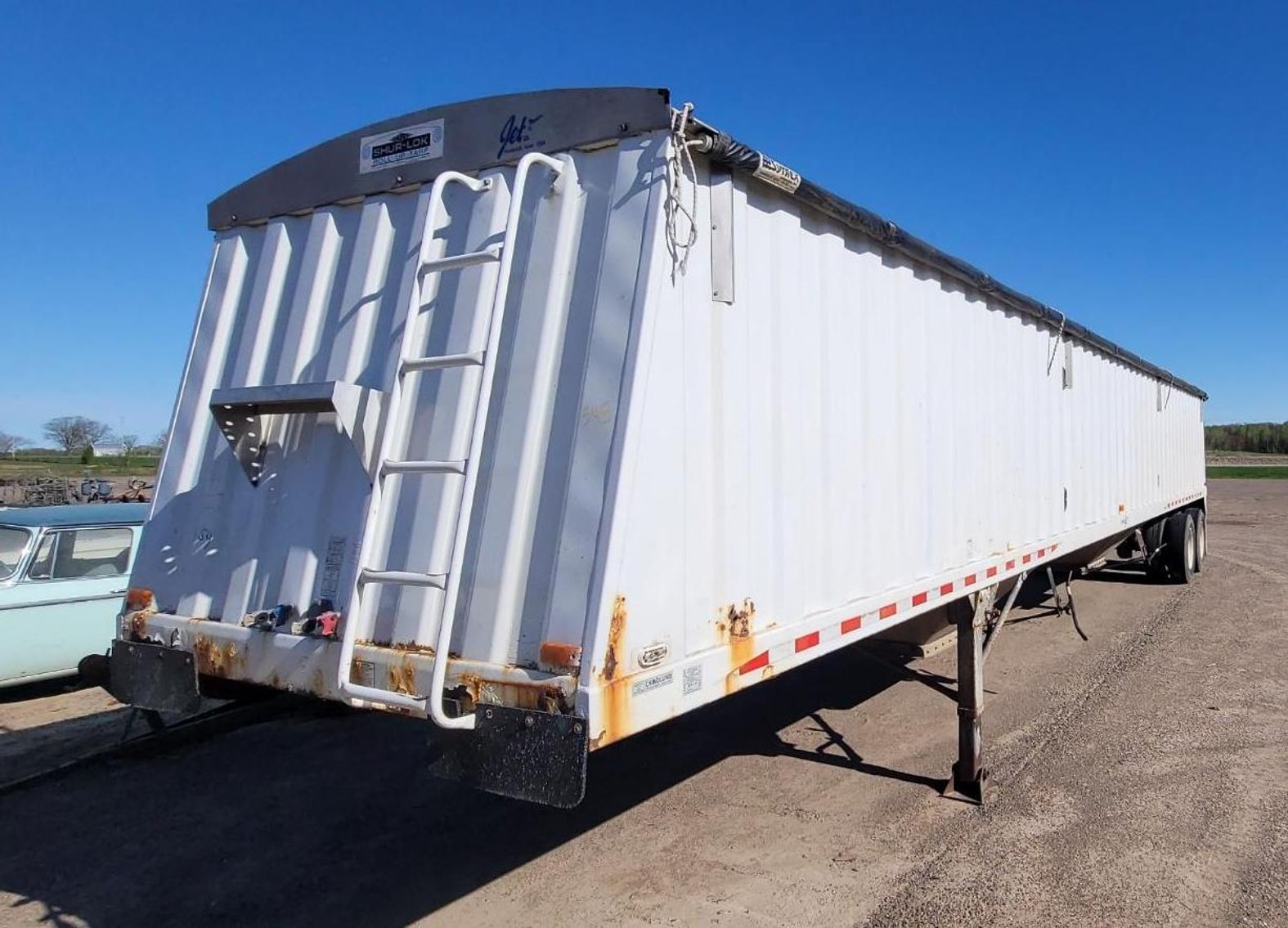 2014 Loadmax 32' Hydraulic Tilt, 1998 Jet 42' Grain Hopper, 16' Cattle/Horse Trailer