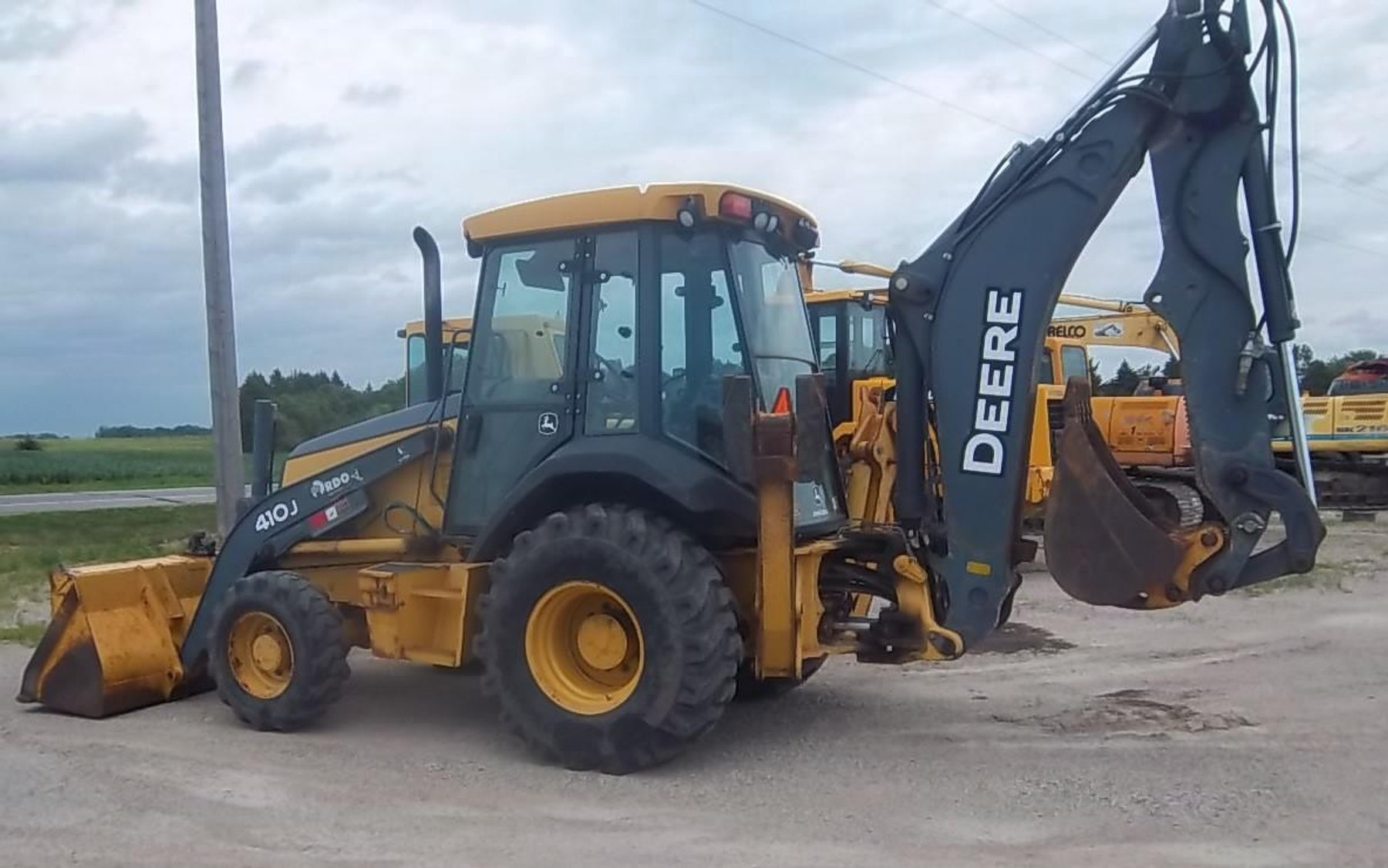 Construction Equipment: Excavators, Compactor, John Deere 410J