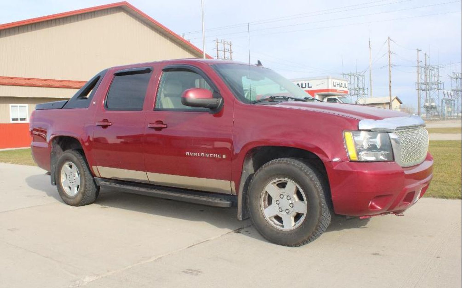 2007 Chevy Avalanche LT, John Deere LX266 Tractor, 1994 Polaris XCR 440