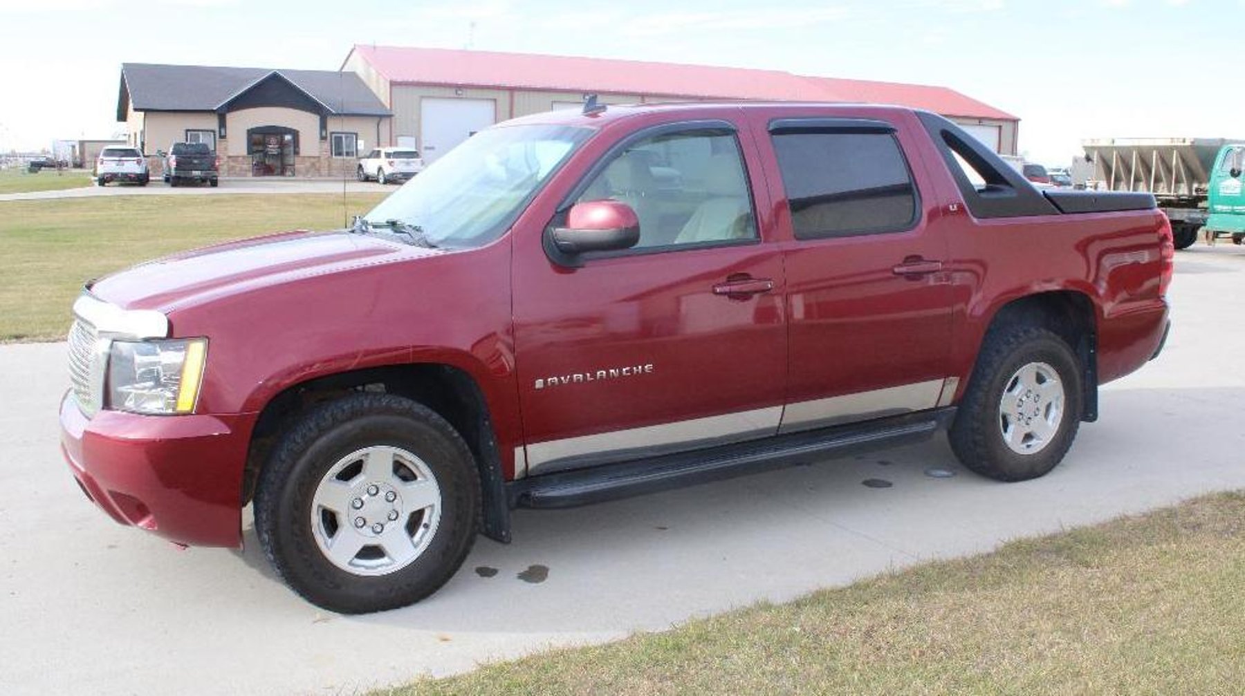 2007 Chevy Avalanche LT, John Deere LX266 Tractor, 1994 Polaris XCR 440