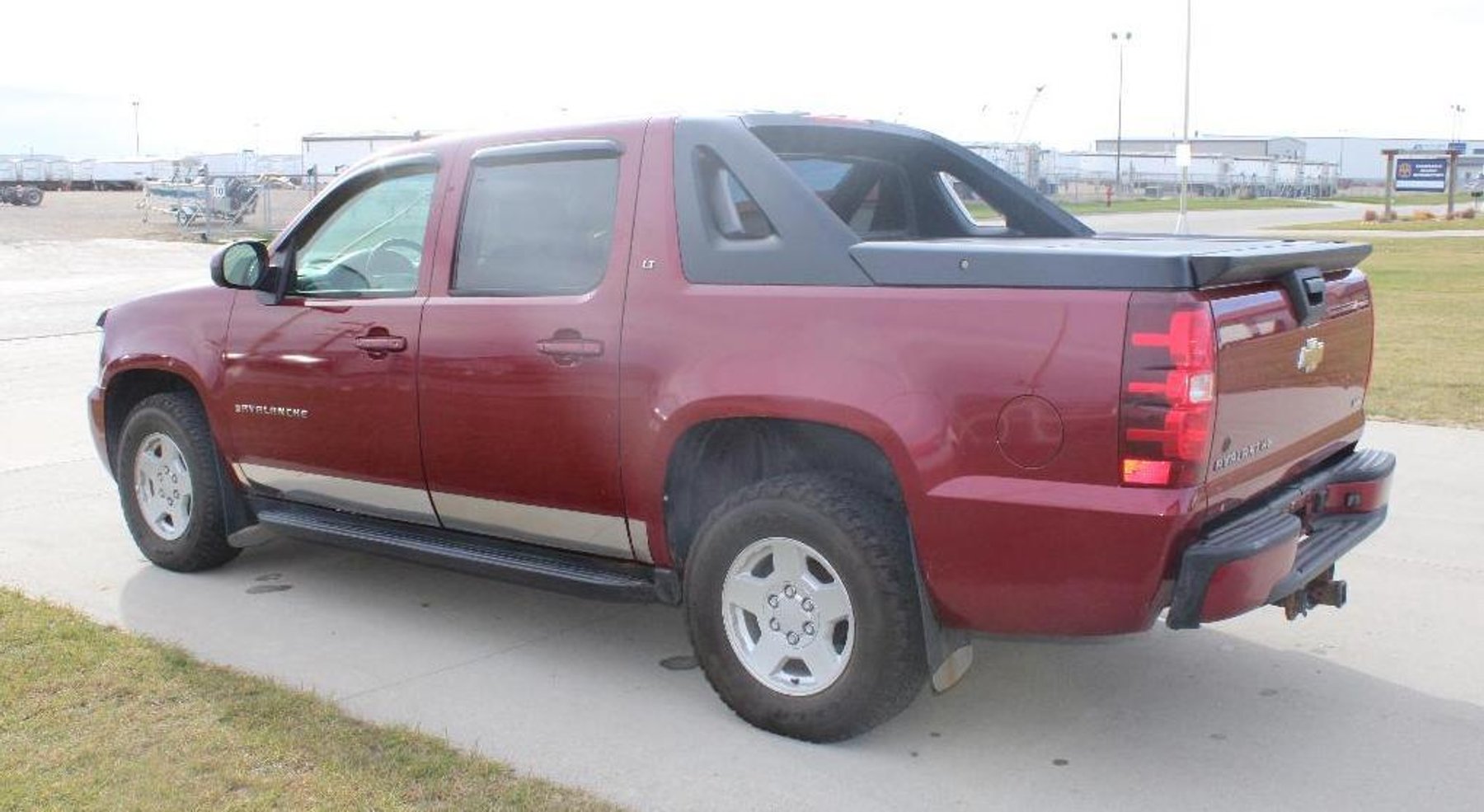 2007 Chevy Avalanche LT, John Deere LX266 Tractor, 1994 Polaris XCR 440