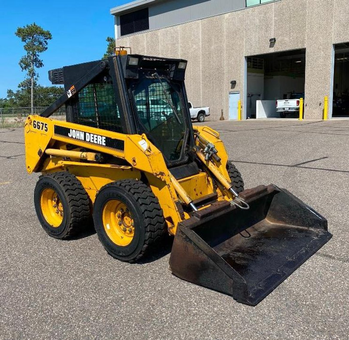 Sherburne County Surplus: John Deere 6675 Skid Steer, 2007 Chevrolet Impala, Treated Poles, Tools and Equipment