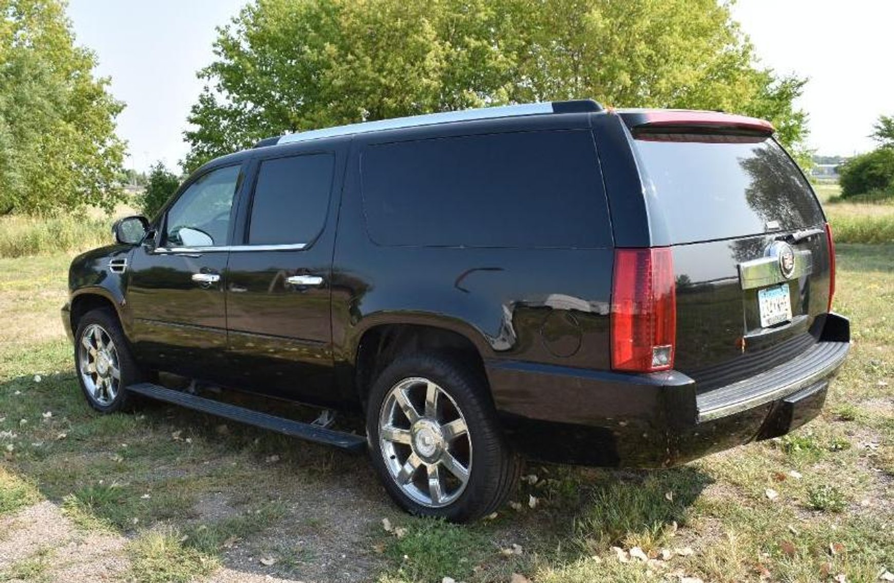 2007 Cadillac Escalade & 2001 Ford Focus