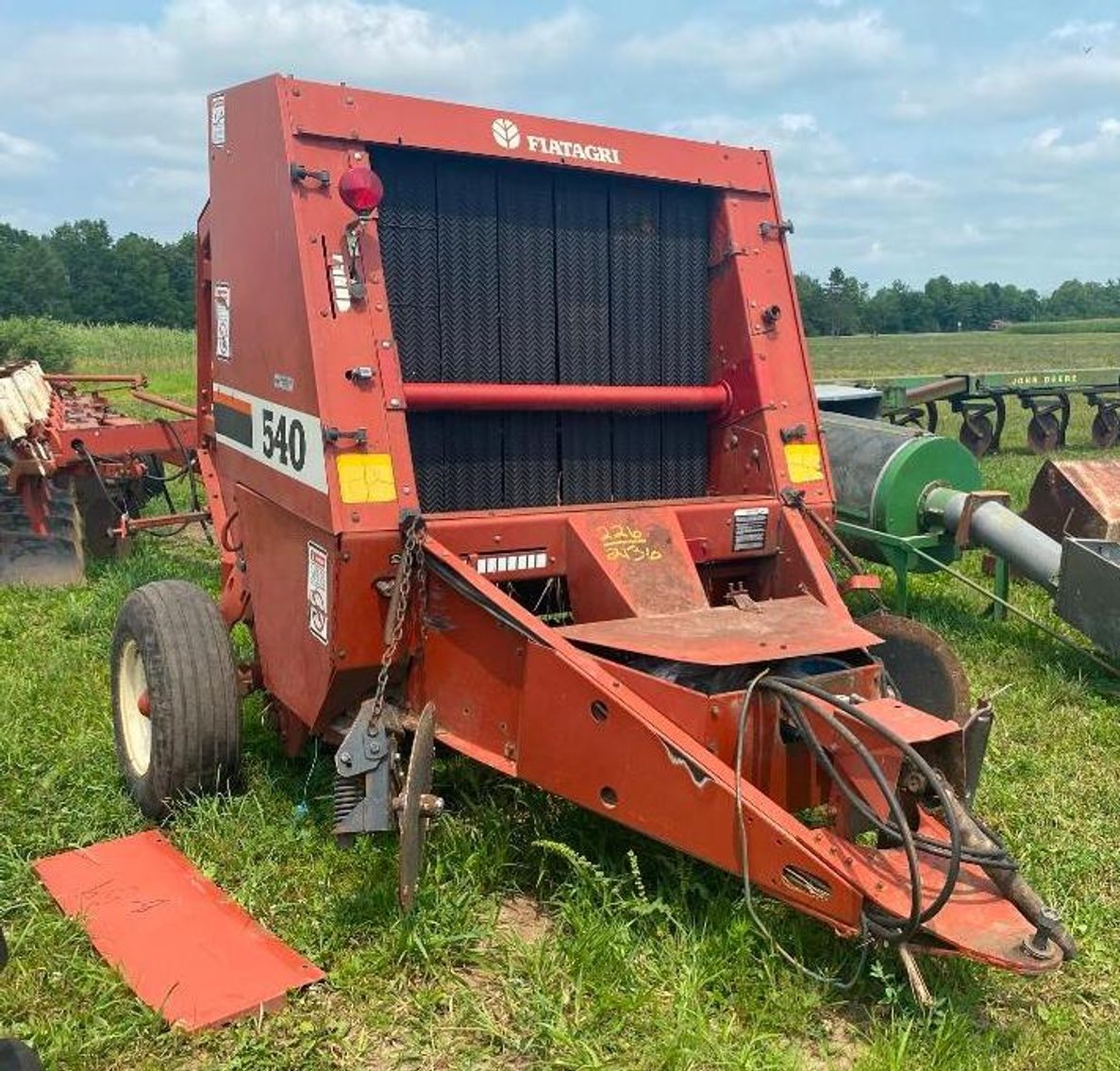 Surplus Farm Equipment, JD Plows, Gravity Box, Baler and More