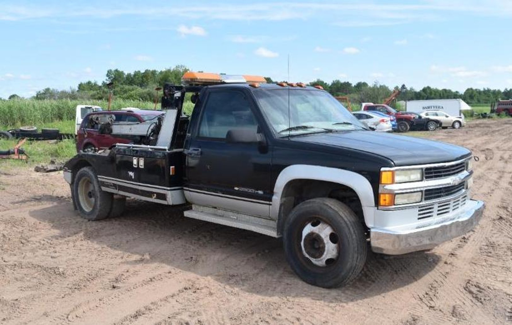 2007 IH 4300 4X2 Roll Back, 1998 Chevy Tow Truck, 2009 IH ProStar Premium, 1990 IH Wrecker, 53' Semi Trailer, 2008 Cadillac Escalade