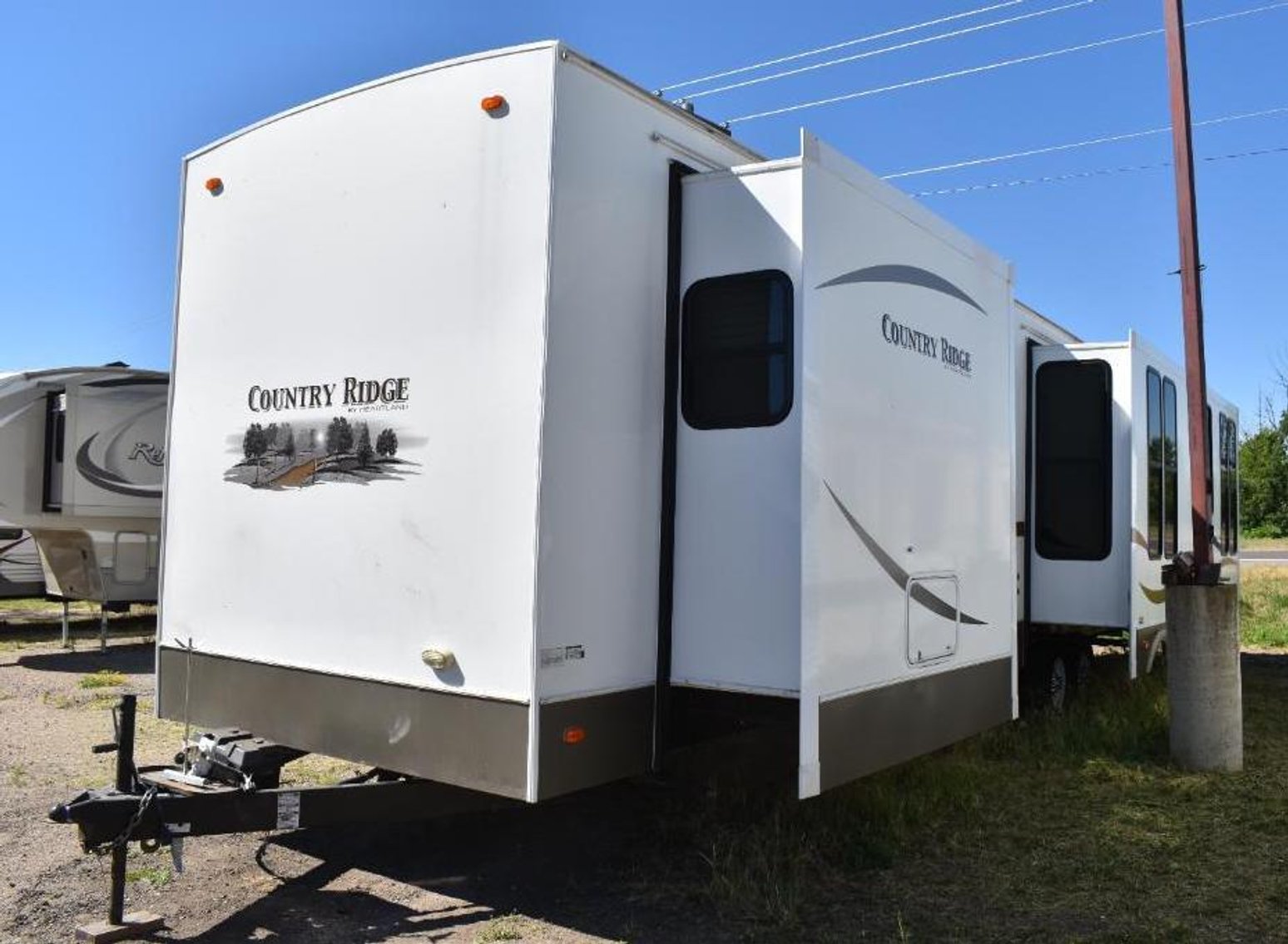 14 Units: (1) Motorhome, (2) 5th Wheels & (11) Travel Trailers