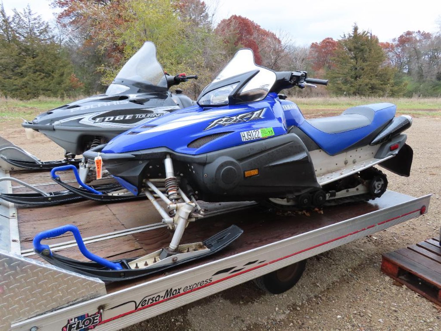 (2) Snowmobiles, Felling 16' Trailer, & Surplus Merchandise