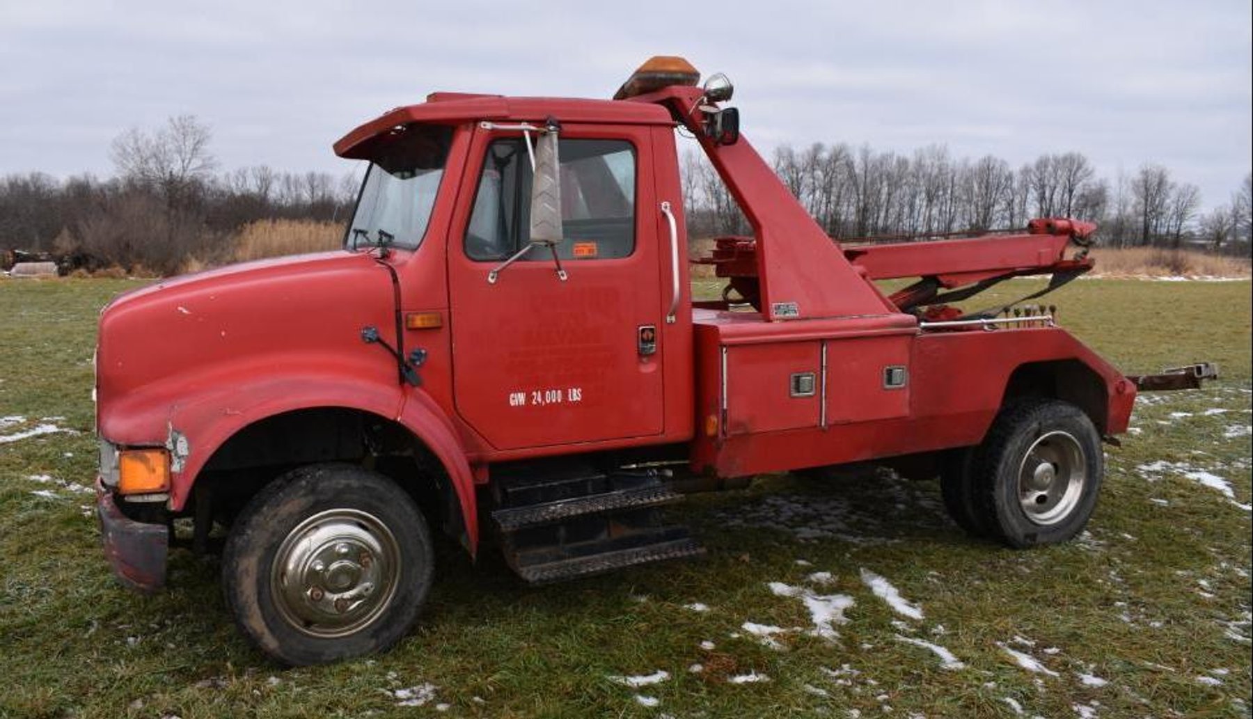 1990 International Wrecker & 2009 Ford F-750 4-Car Hauler