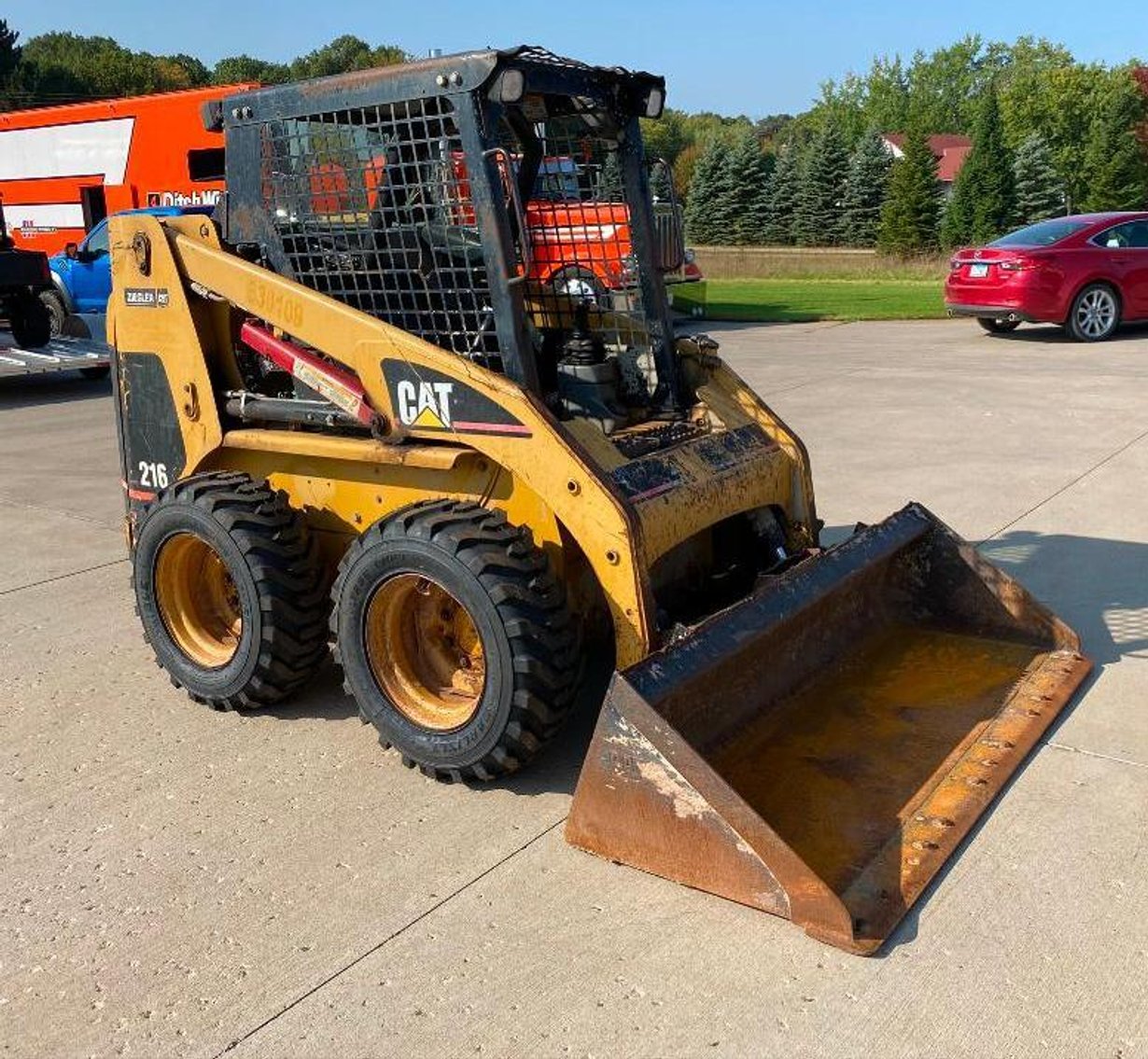 Cat 216 Skid Loader & John Deere B Narrow Front Tractor