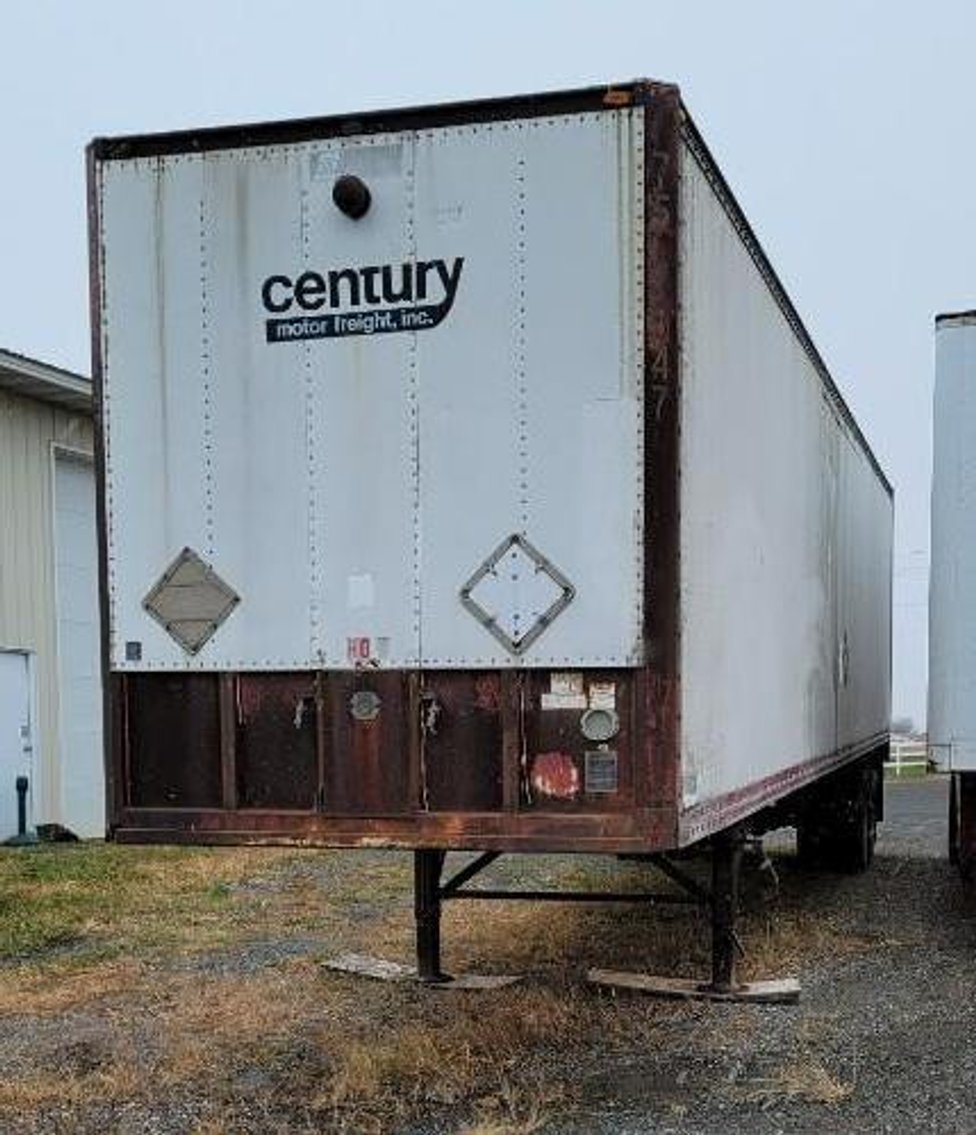 (5) Storage Trailers, 1999 International 4700 Straight Truck, 2002 CampMaster Toy Hauler