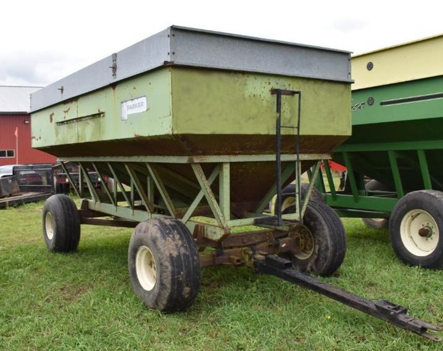 (5) Gravity Boxes, Mighty 8 Round Bale Hauler & Massey Ferguson 1100 Diesel Tractor