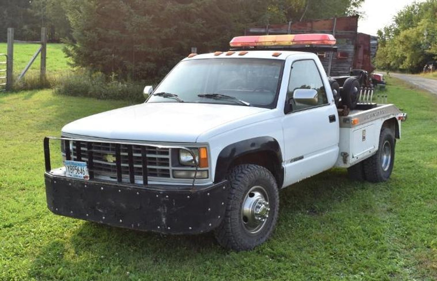 1991 Chevrolet Cheyenne 3500 Tow Truck & Vintage Gas Pump