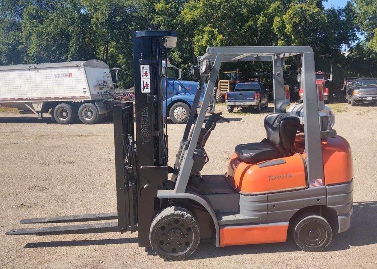 2015 New Holland 230 Skid Steer, 2013 John Deere 825i, Toyota Forklift, (3) Westfield Augers