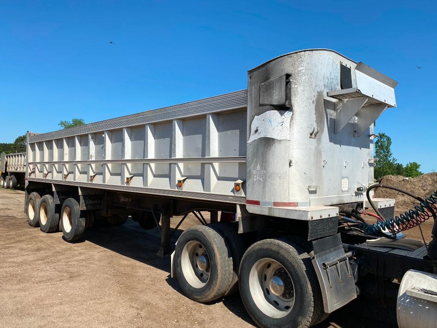 Construction Equipment: End Dump, Michigan 125C Loader, 2010 Ford F-250, 52' Step Deck, Ford 9000 Cable Truck