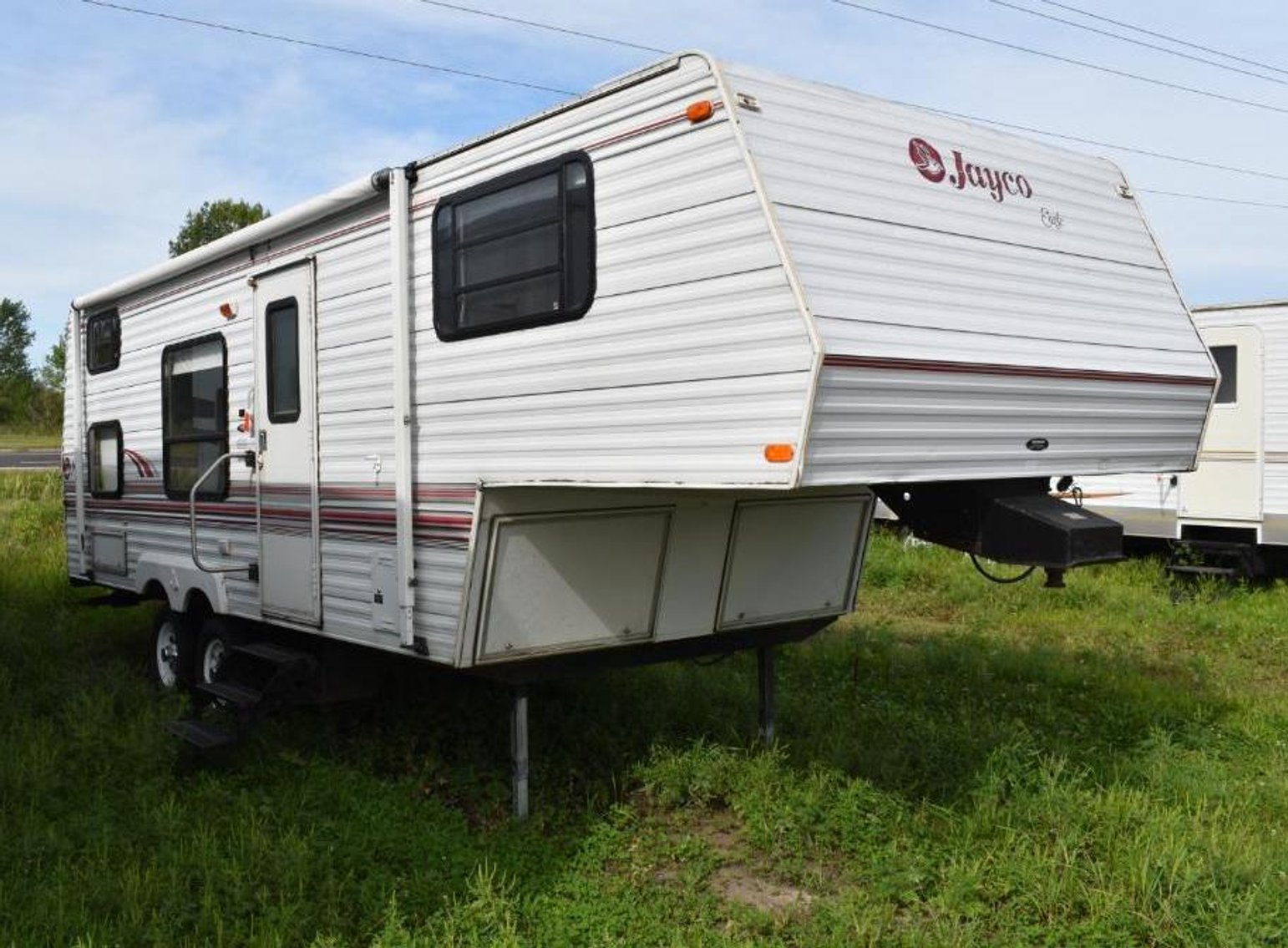 15 Units: Park Model, (10) Travel Trailers, (4) 5th Wheels