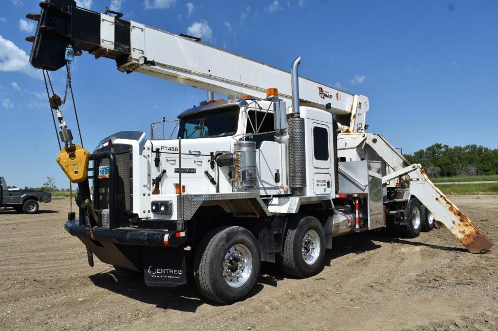 (3) Heavy Haul Trucks, (2) Cranes and Equipment