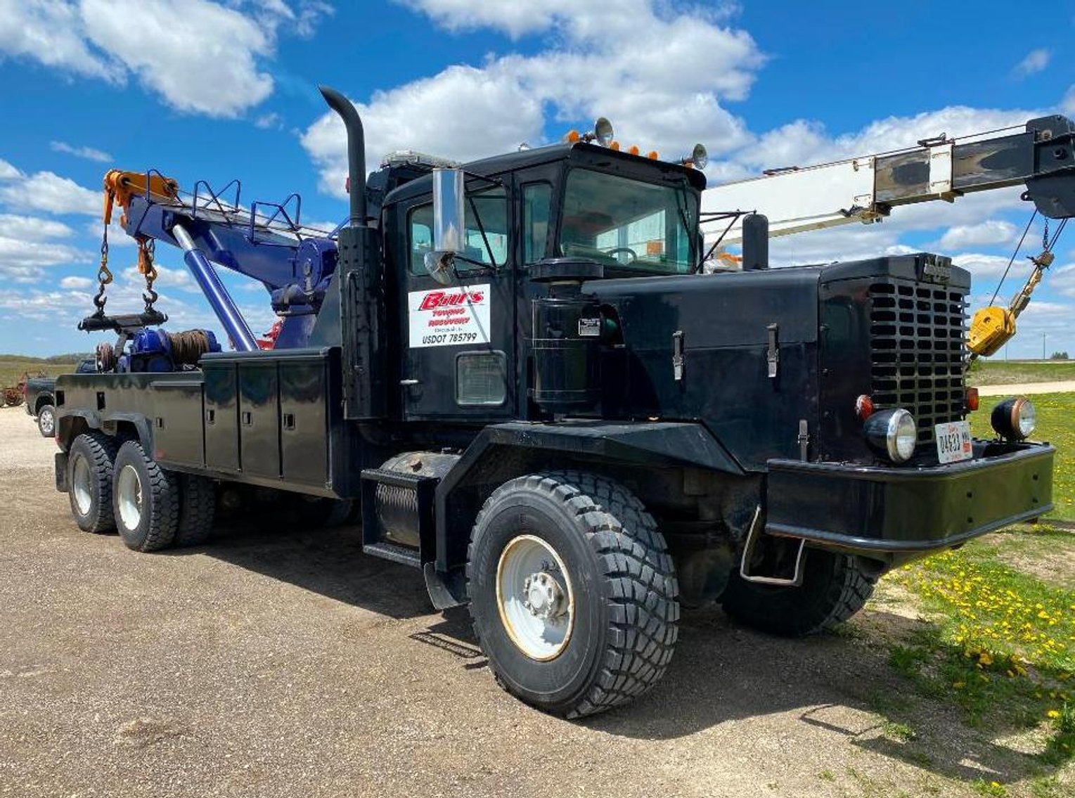 (3) Heavy Haul Trucks, (2) Cranes and Equipment