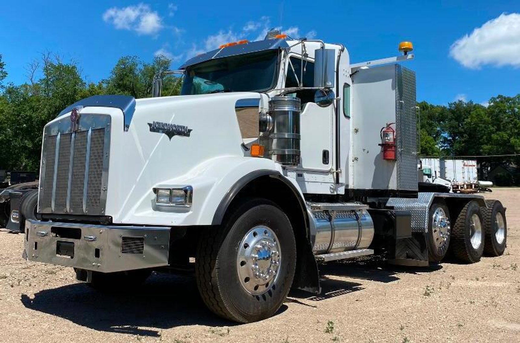 (7) Semis, (8) Grain Trailers, 1981 Versatile 950, 2007 International Bucket Truck